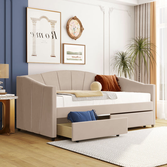 Beige upholstered daybed with two pullout drawers and channel tufting