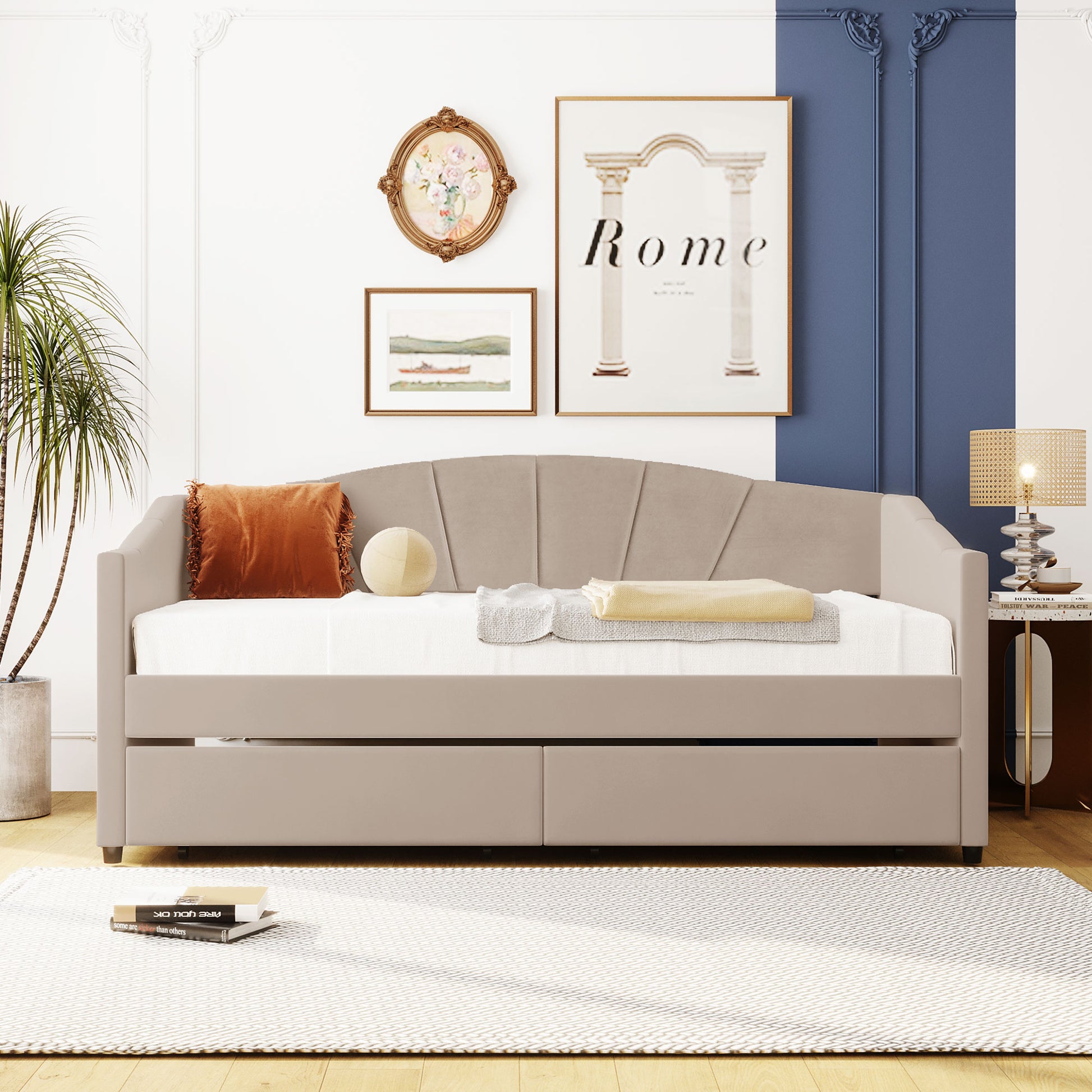 Taupe velvet daybed with fanshaped headboard and pullout trundle