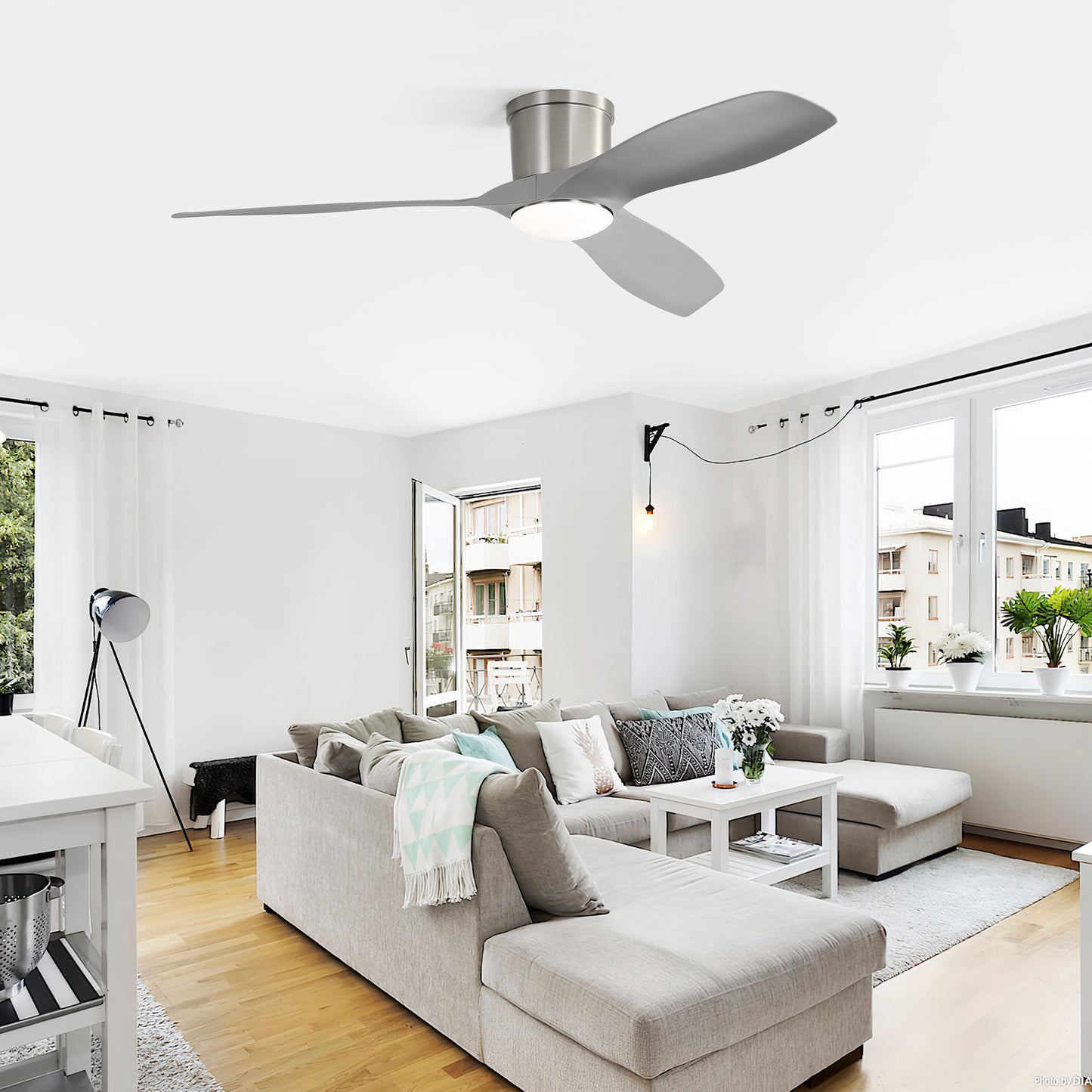 Modern brushed nickel ceiling fan with three grey blades and integrated LED light