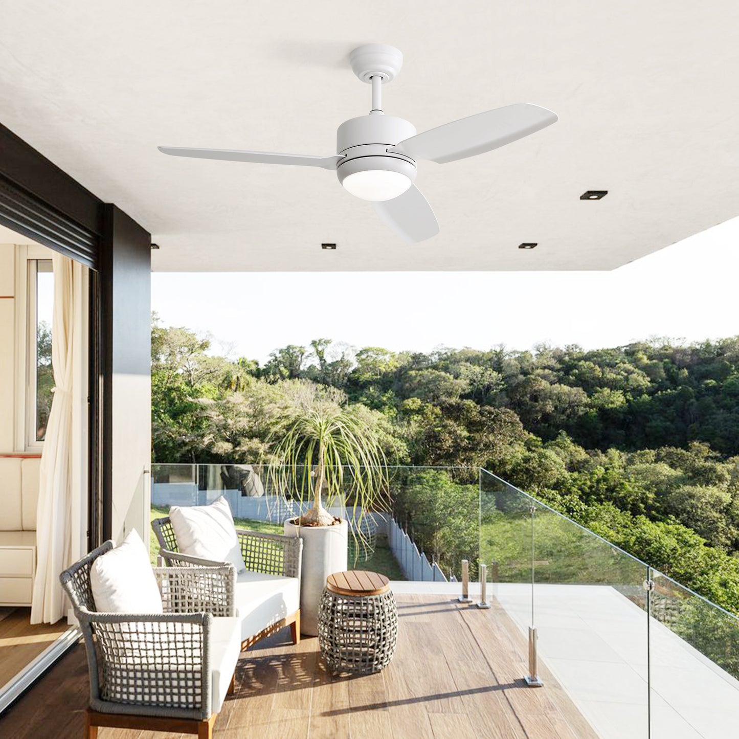 Modern white ceiling fan with LED light on a covered patio
