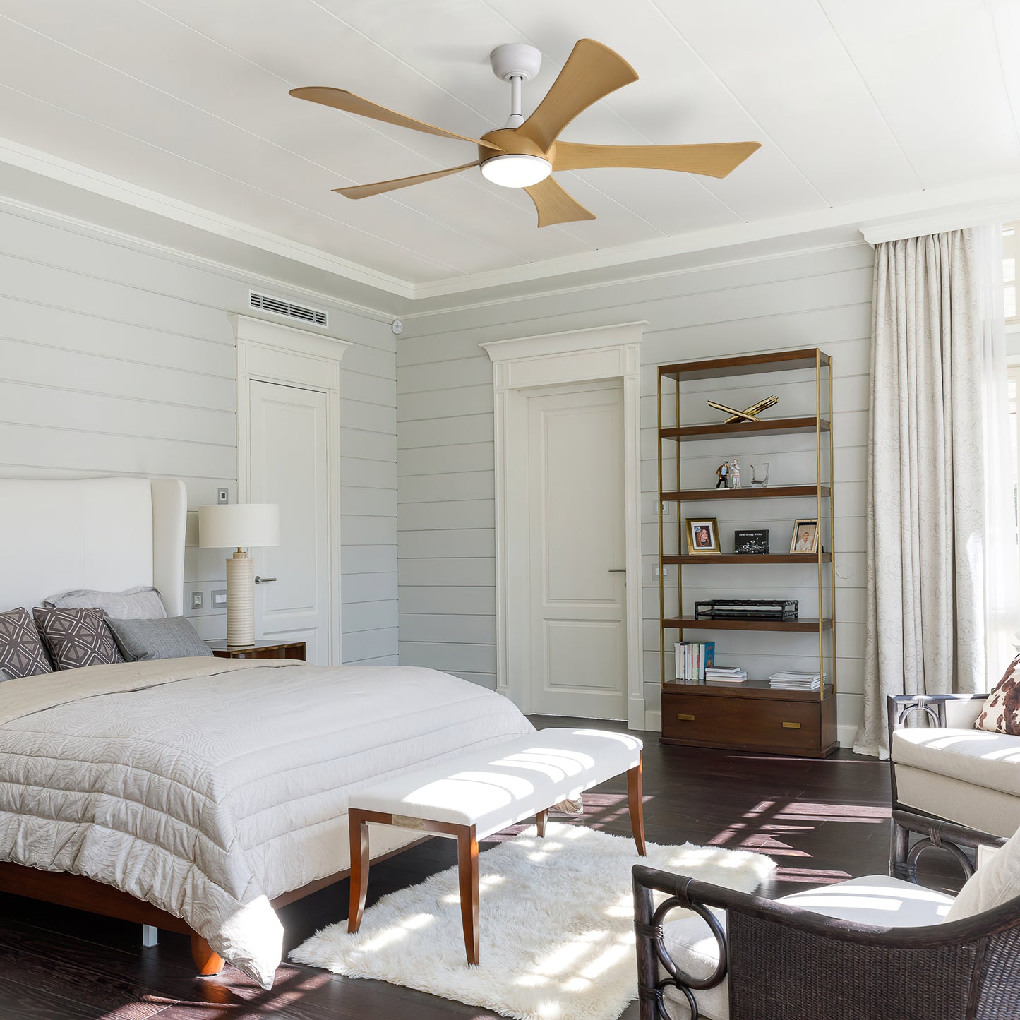 White ceiling fan with five wooden blades and integrated LED light fixture