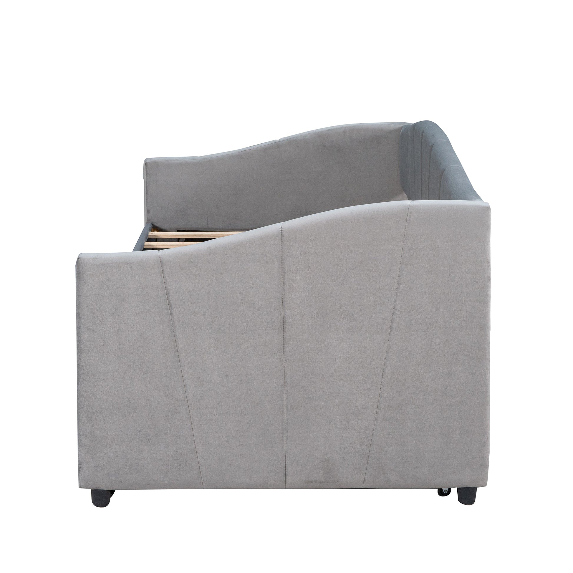 Gray velvet daybed with piped seams and wooden slat base