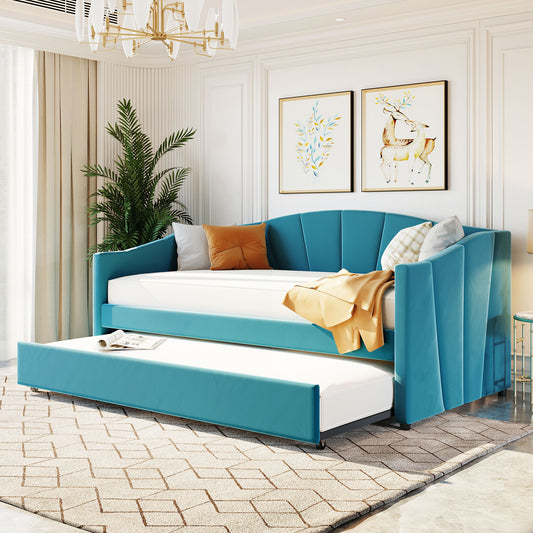 Teal velvet daybed with trundle features plush upholstery and tufted backrest Ideal for guest rooms