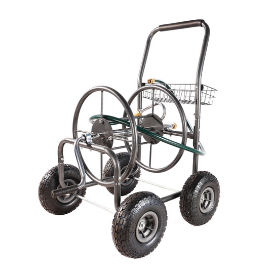 Garden hose reel cart with large pneumatic tires and basket for tools