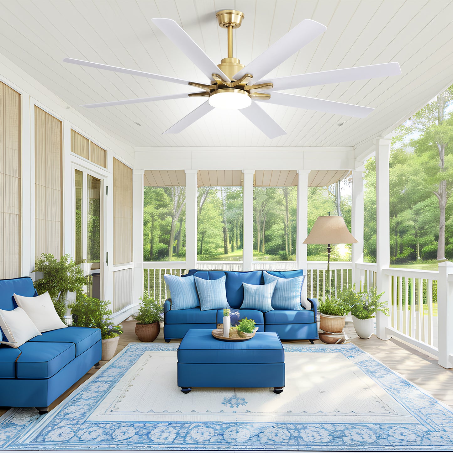 Brass blade ceiling fan with white blades and integrated LED light on a screened porch
