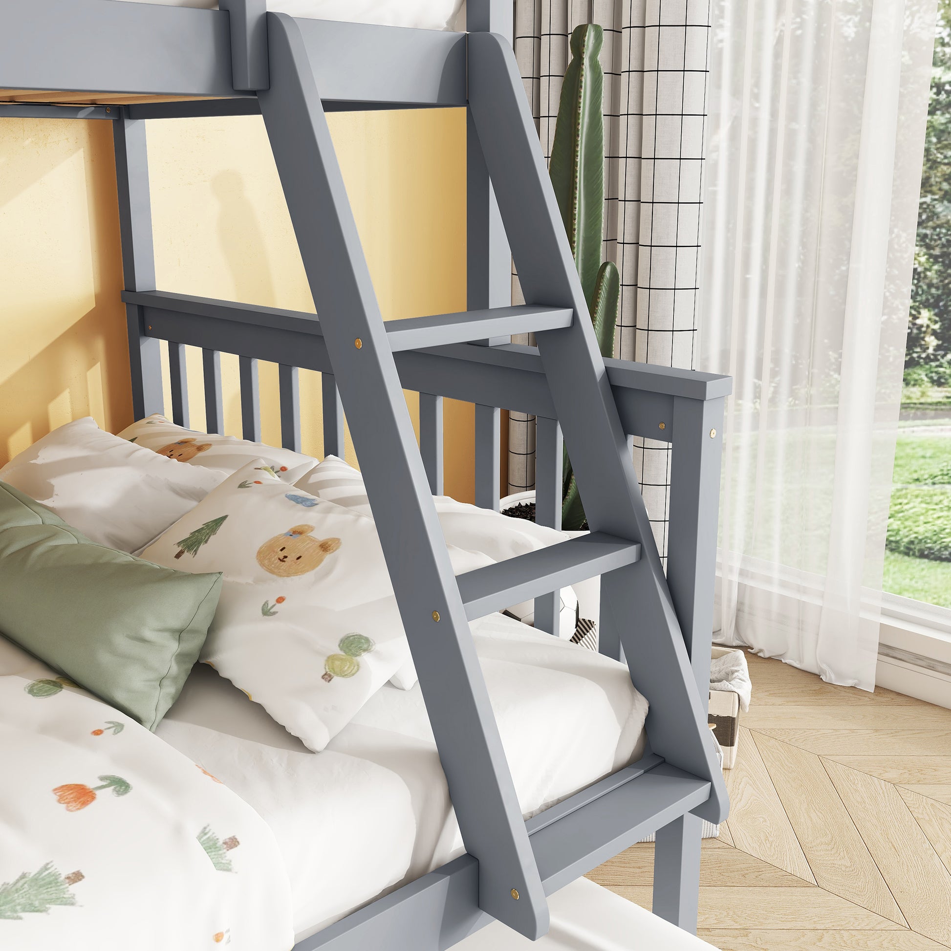 Gray wooden bunk bed with ladder and kids bedding