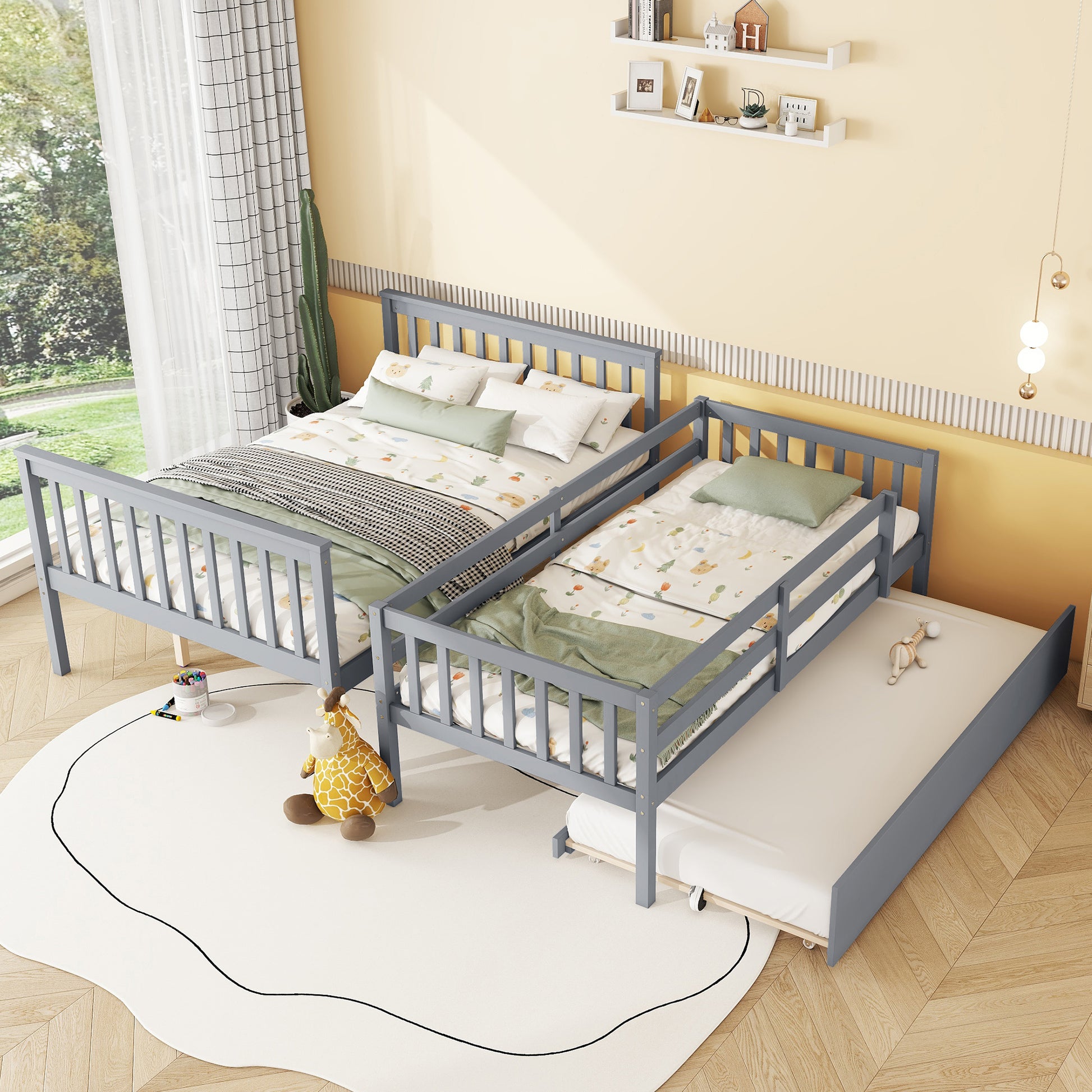 Gray wooden bunk bed with pullout trundle for kids