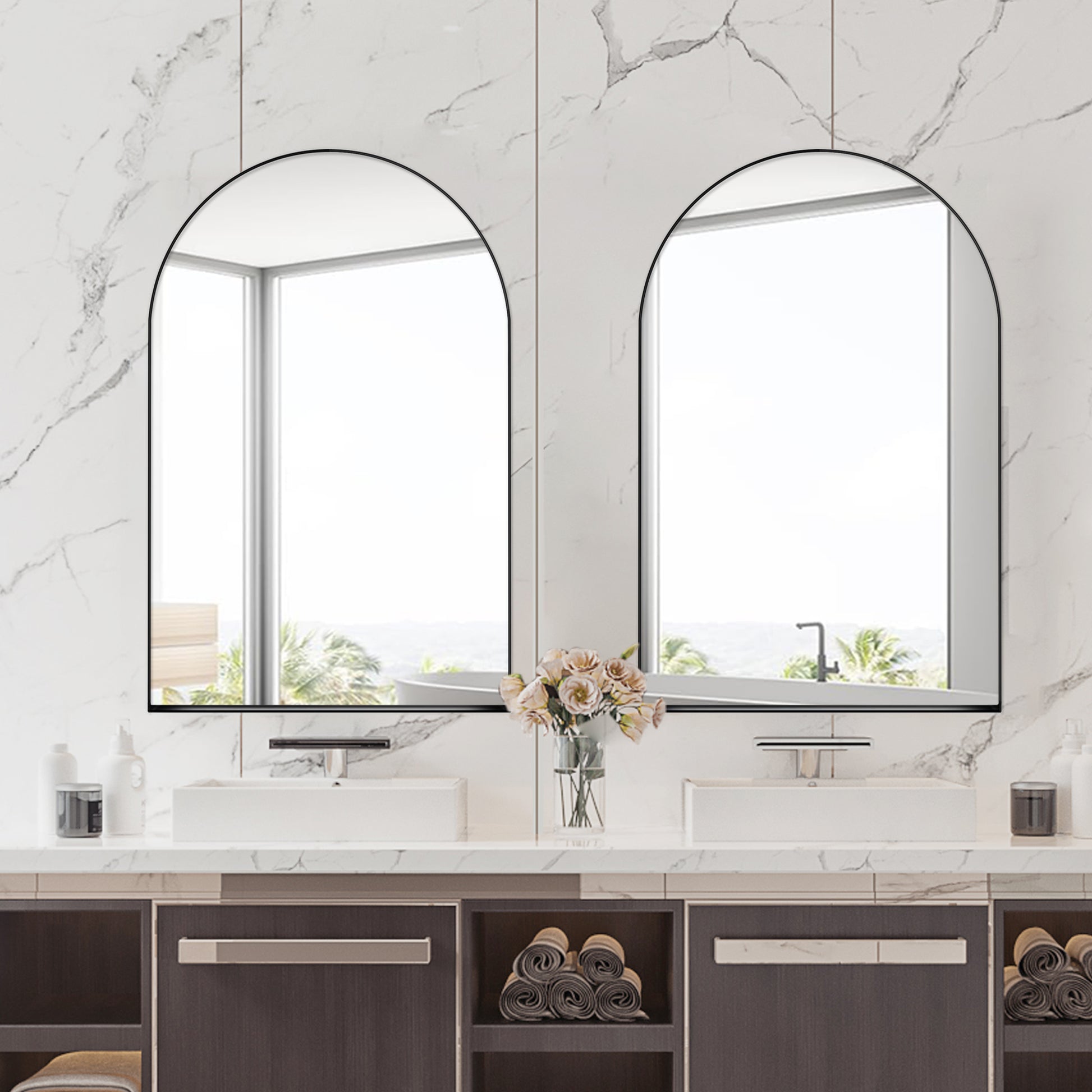 Black arched vanity mirror with rounded corners for a modern bathroom