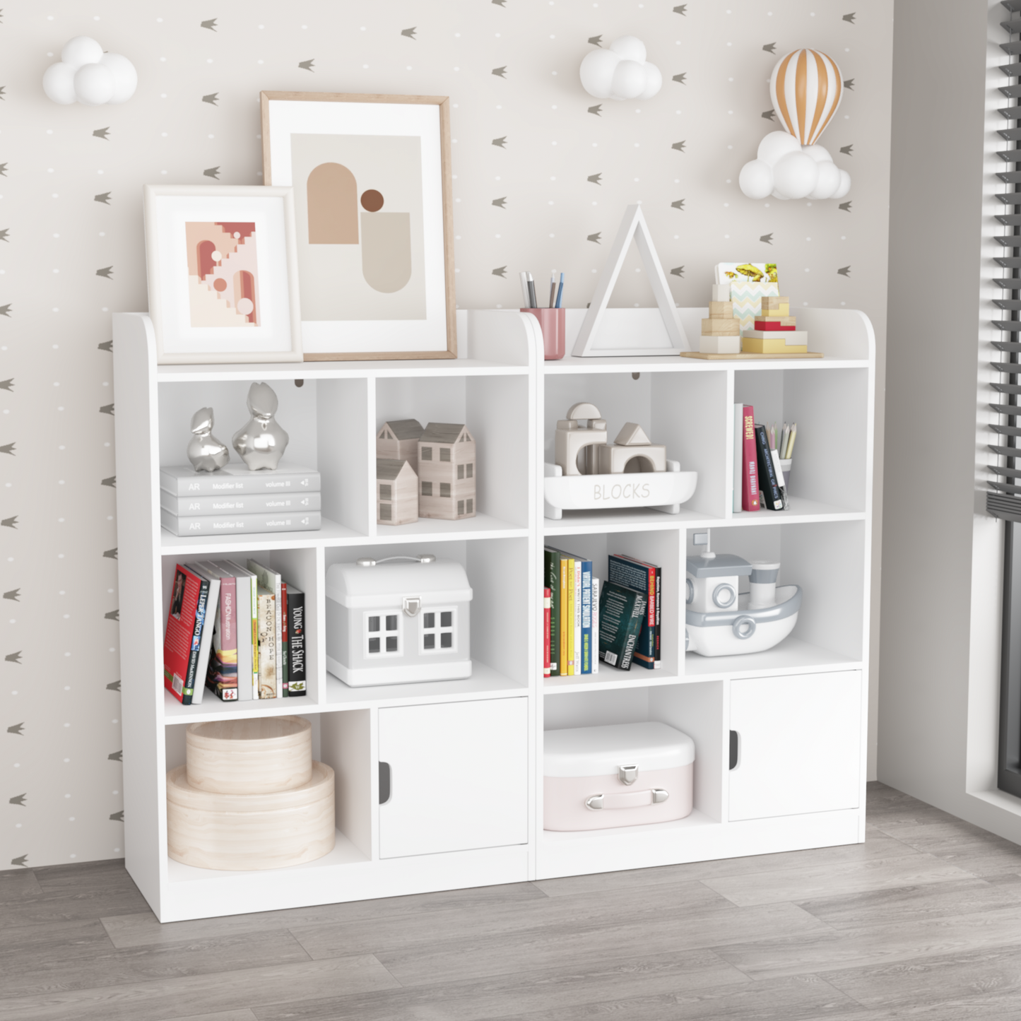 White bookshelf with abstract art and books for a nursery