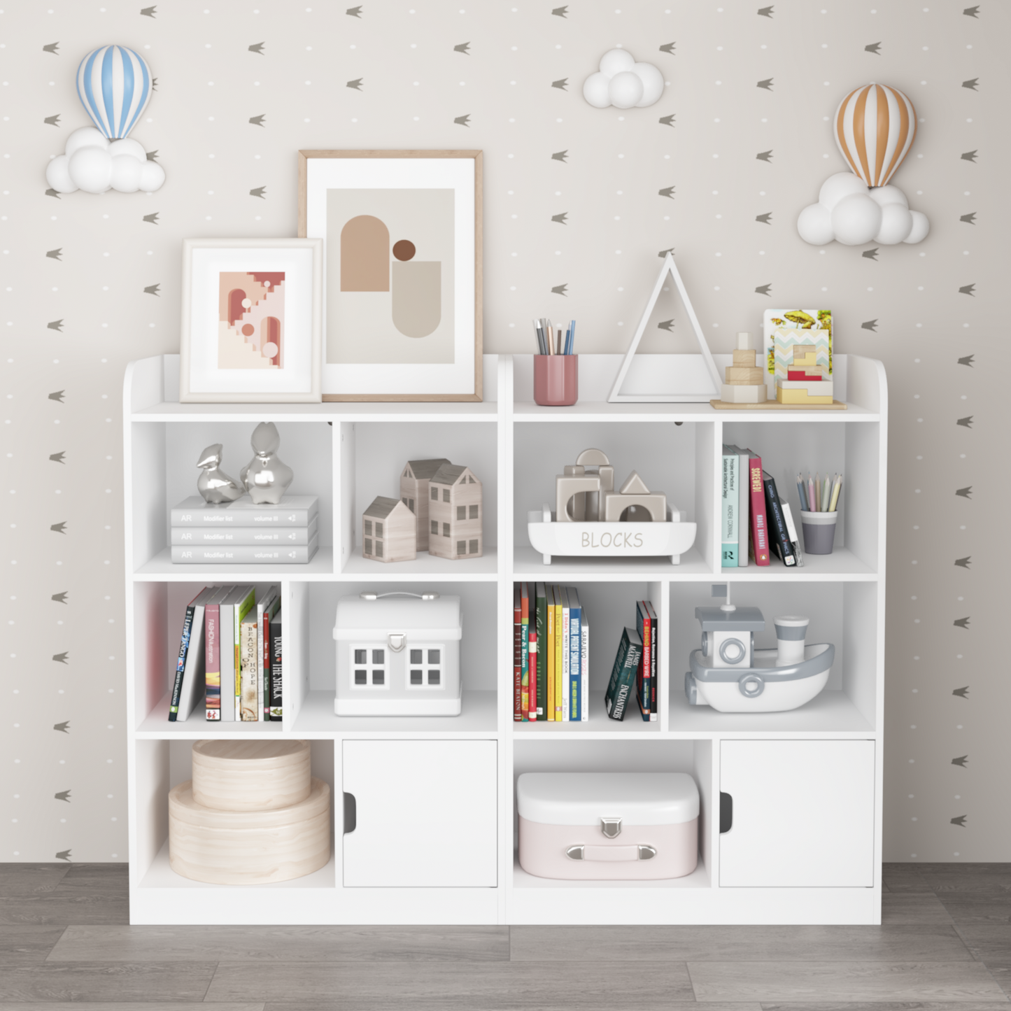 White modern bookshelf filled with kids books decorative houses and toys