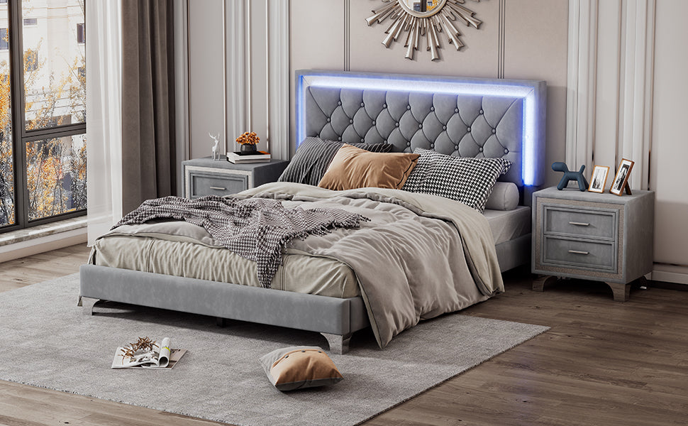 Plush grey velvet upholstered platform bed with LED lighting and tufted headboard