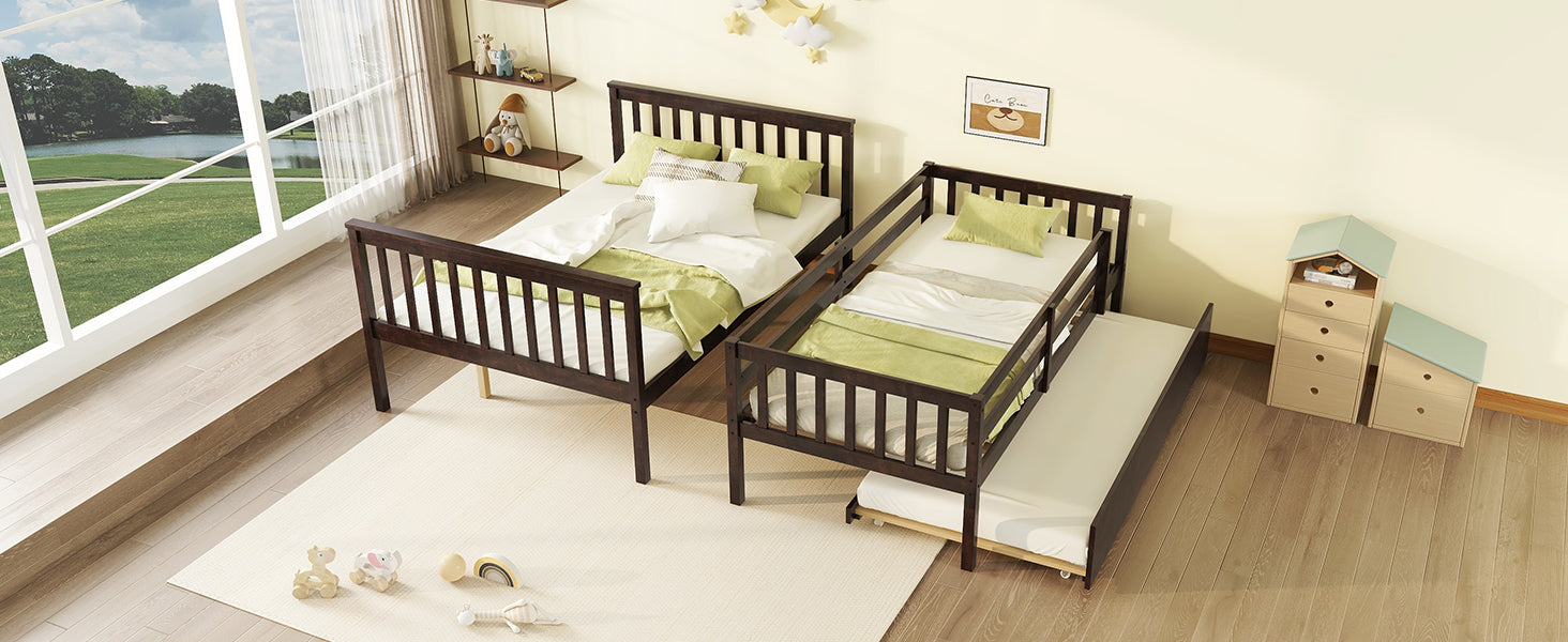 Dark wood twin bed with pullout trundle and green bedding