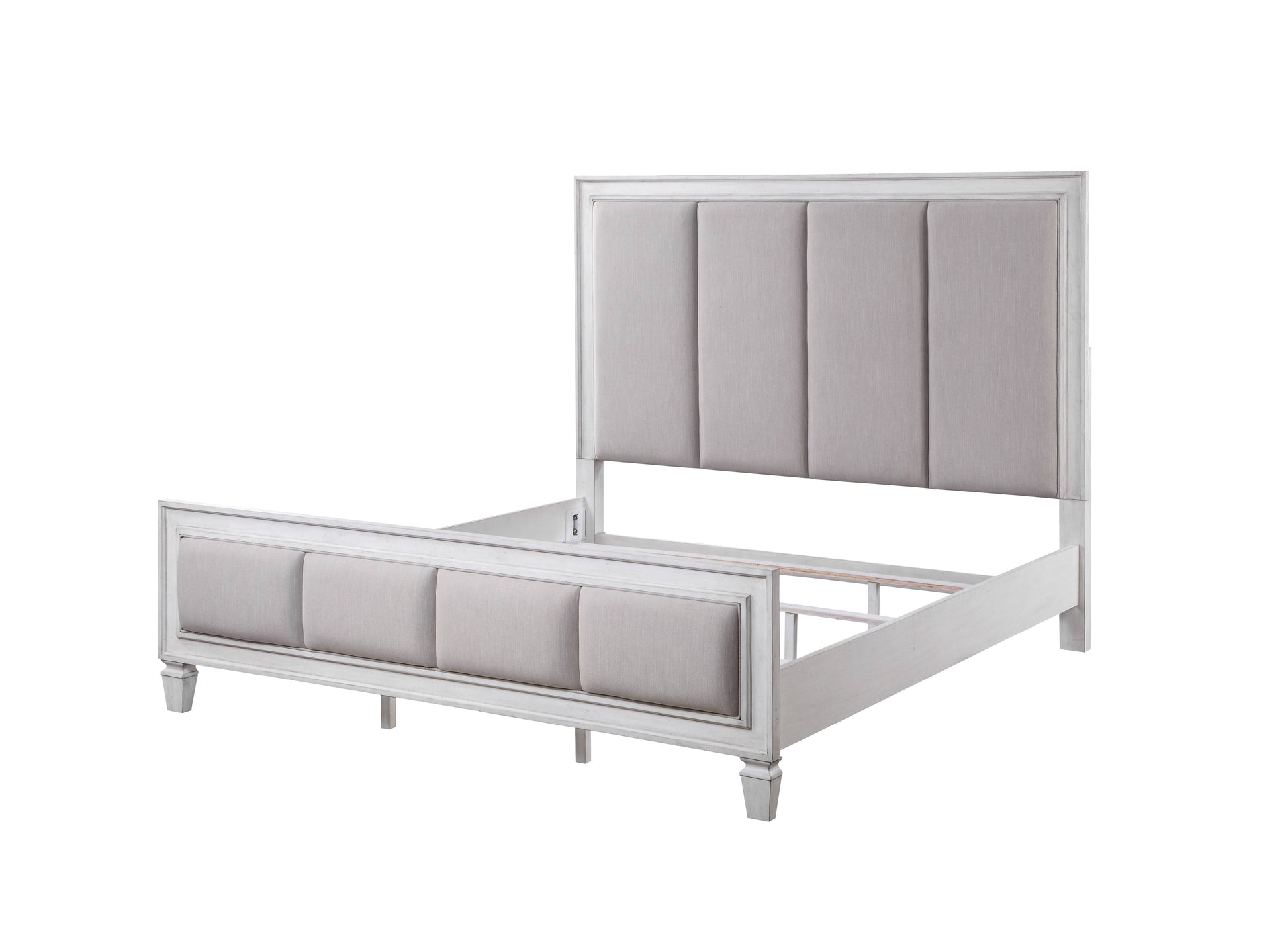 White upholstered king bed frame with tufted headboard and footboard