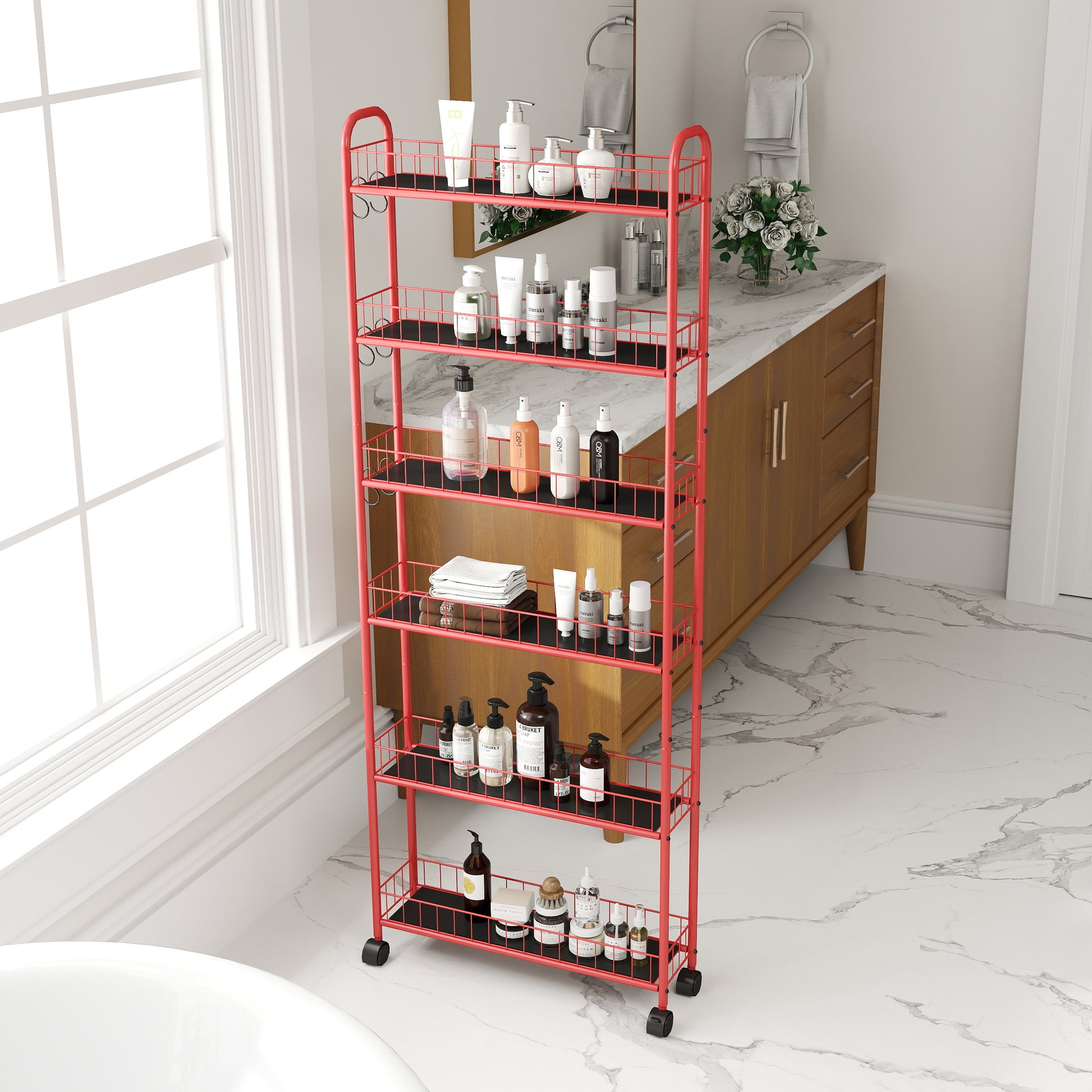 Red rolling bathroom cart filled with skincare bottles and towels