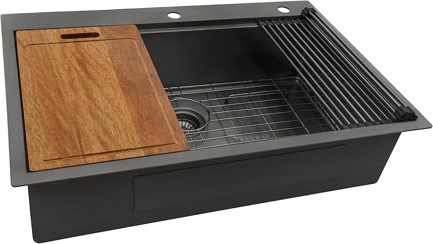 Black granite composite sink with wooden cutting board and drying rack