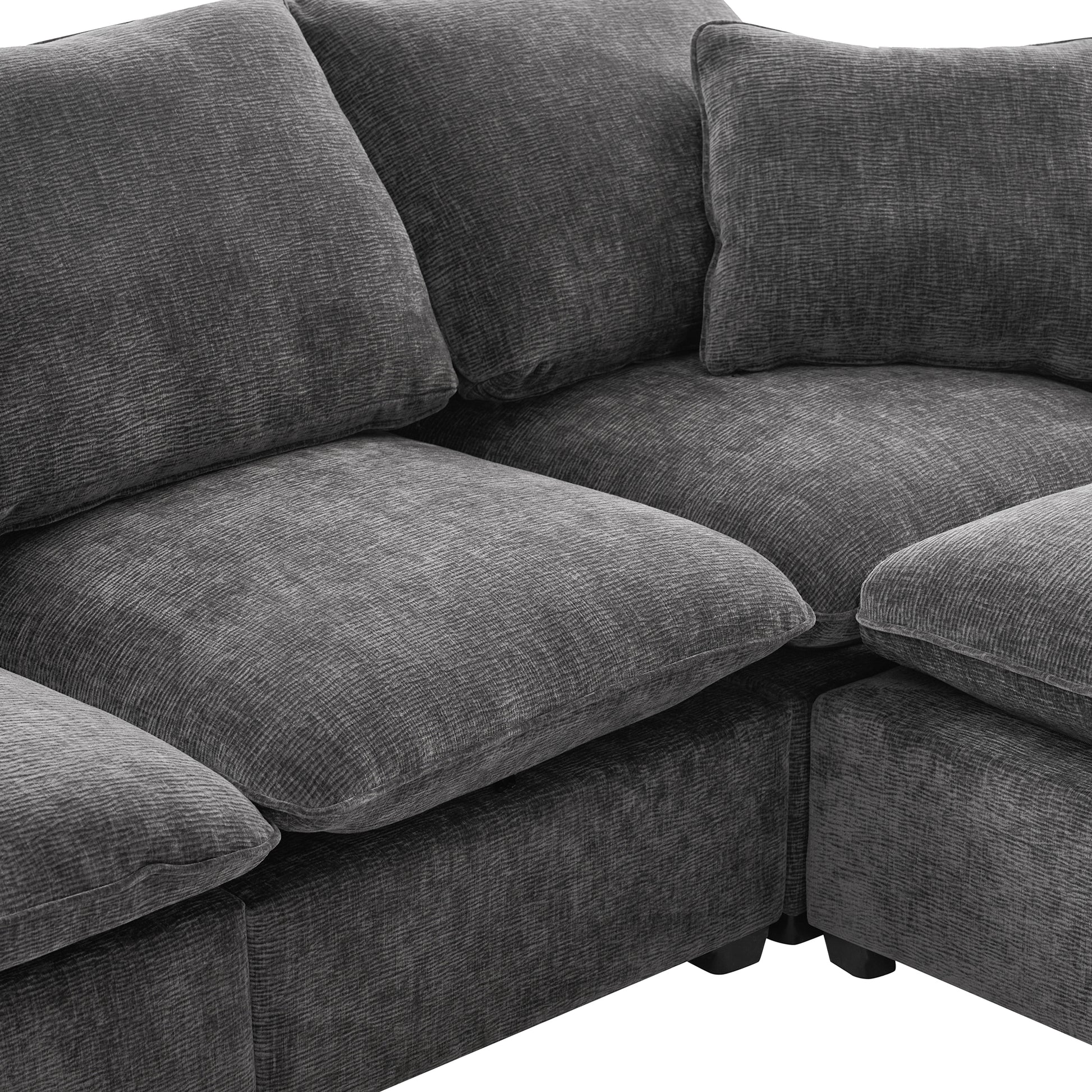 Plush dark grey textured fabric sectional sofa with deep cushions for ultimate comfort