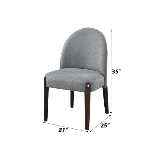 Elegant grey fabric dining chair with dark wood legs and gold accents perfect for modern homes