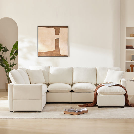 Plush cream modular sectional sofa with ample seating and cozy throw pillows