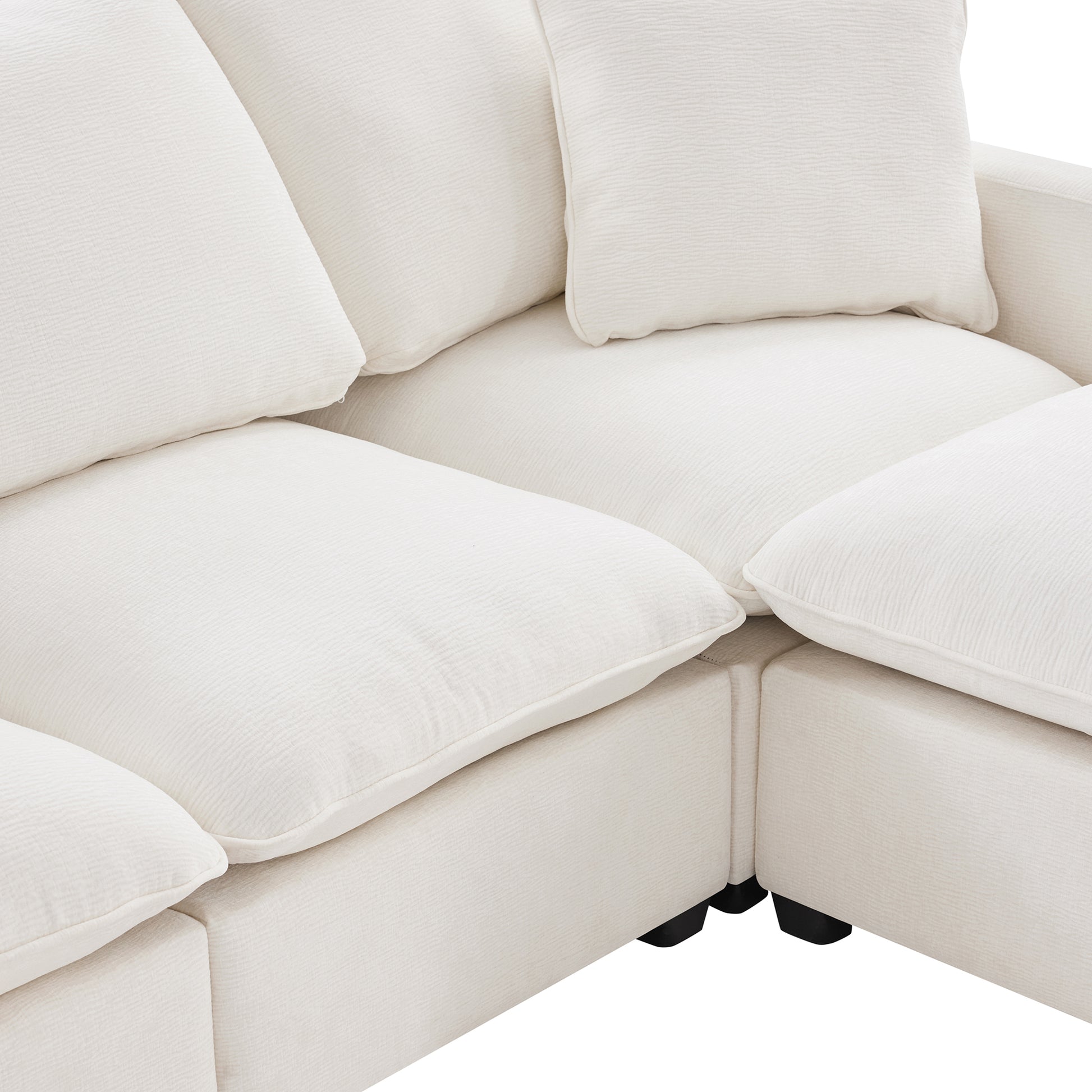Plush white sectional sofa with textured fabric and deep cushions perfect for modern living rooms