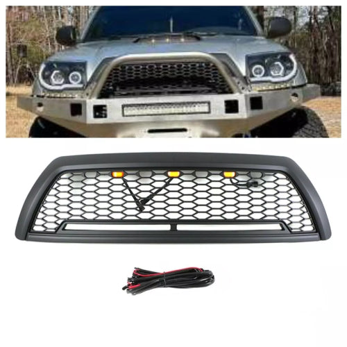 Black honeycomb front grille with amber LED lights for offroad trucks