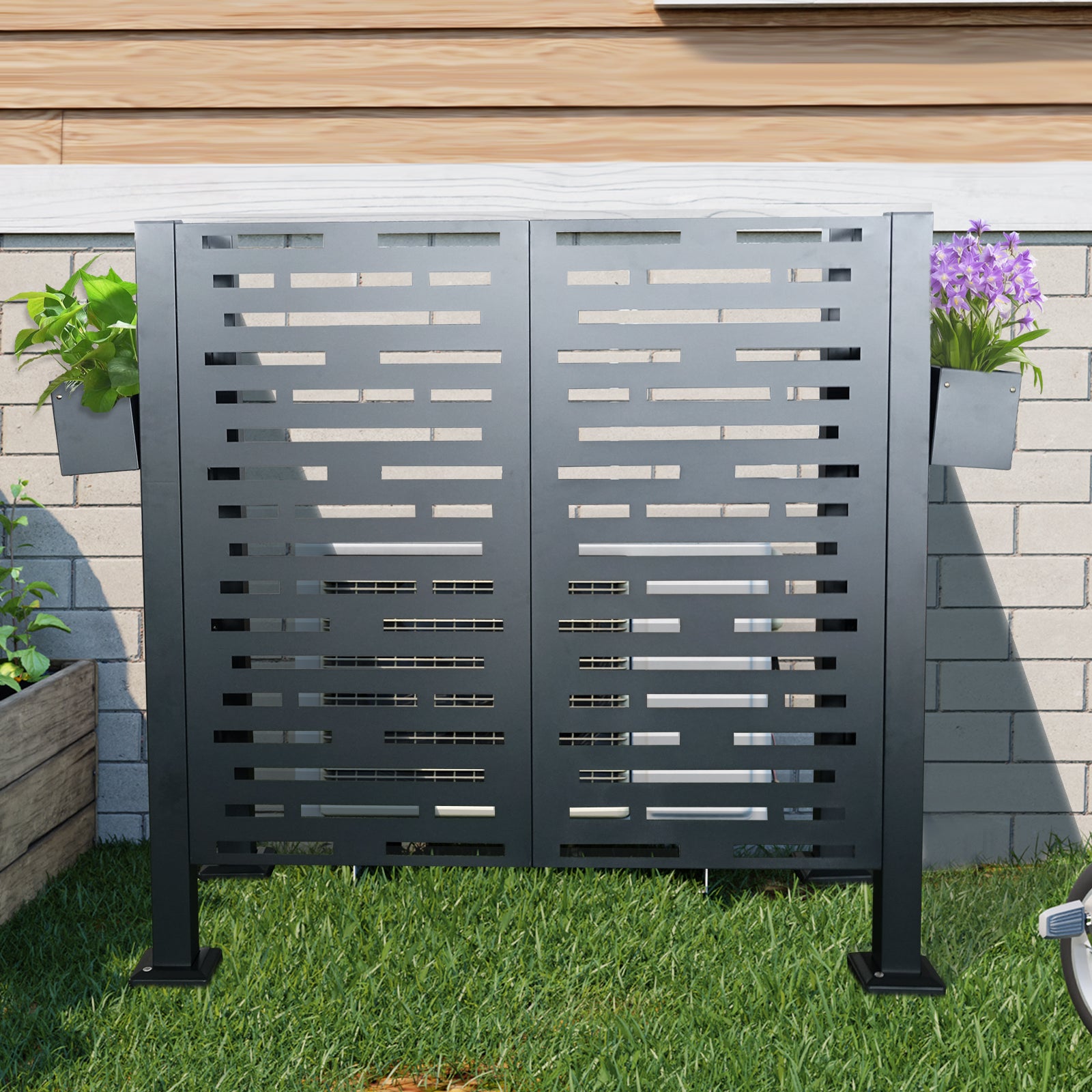 Dark gray metal outdoor air conditioner screen with planter boxes on sides