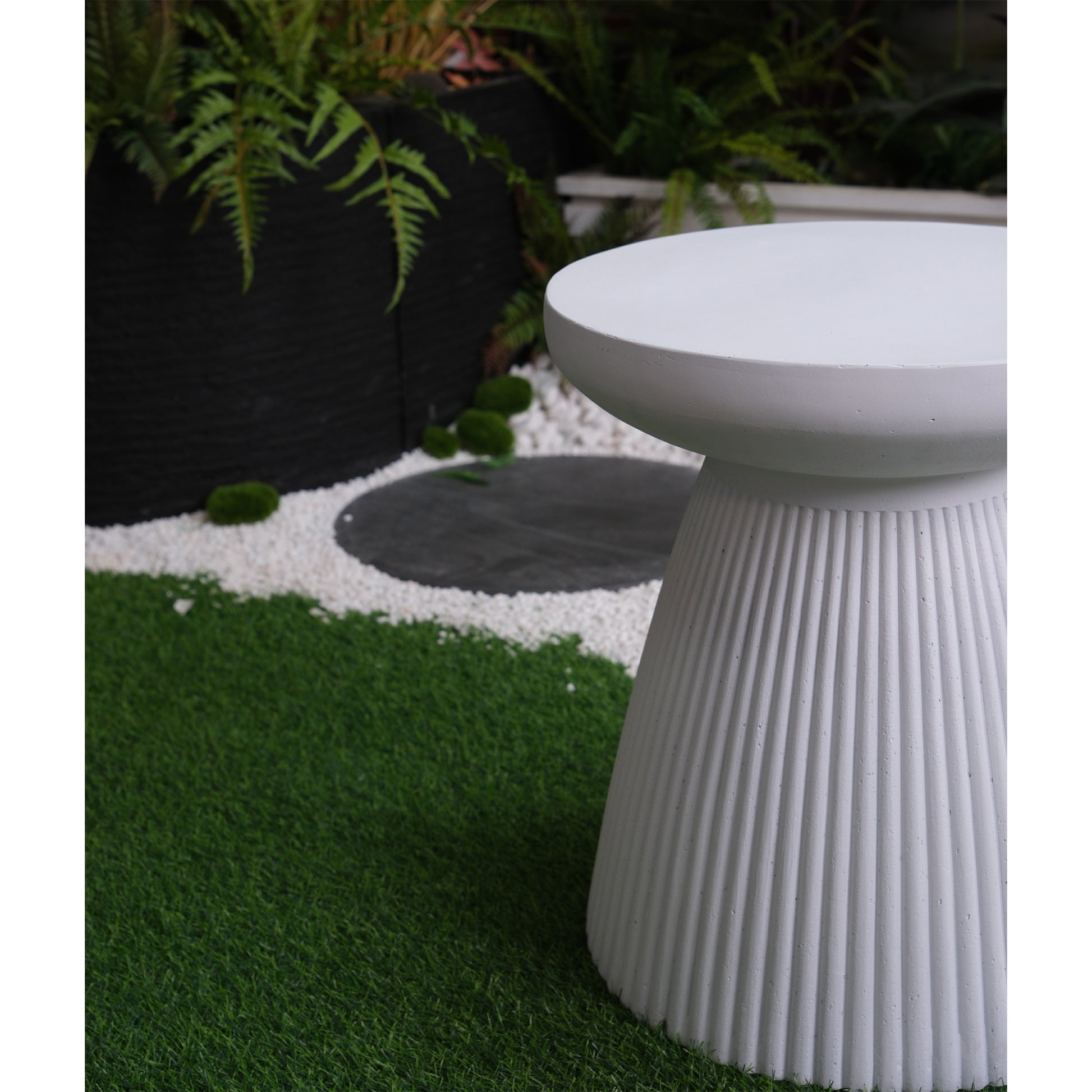 Fluted white concrete garden stool modern outdoor accent piece with ribbed texture