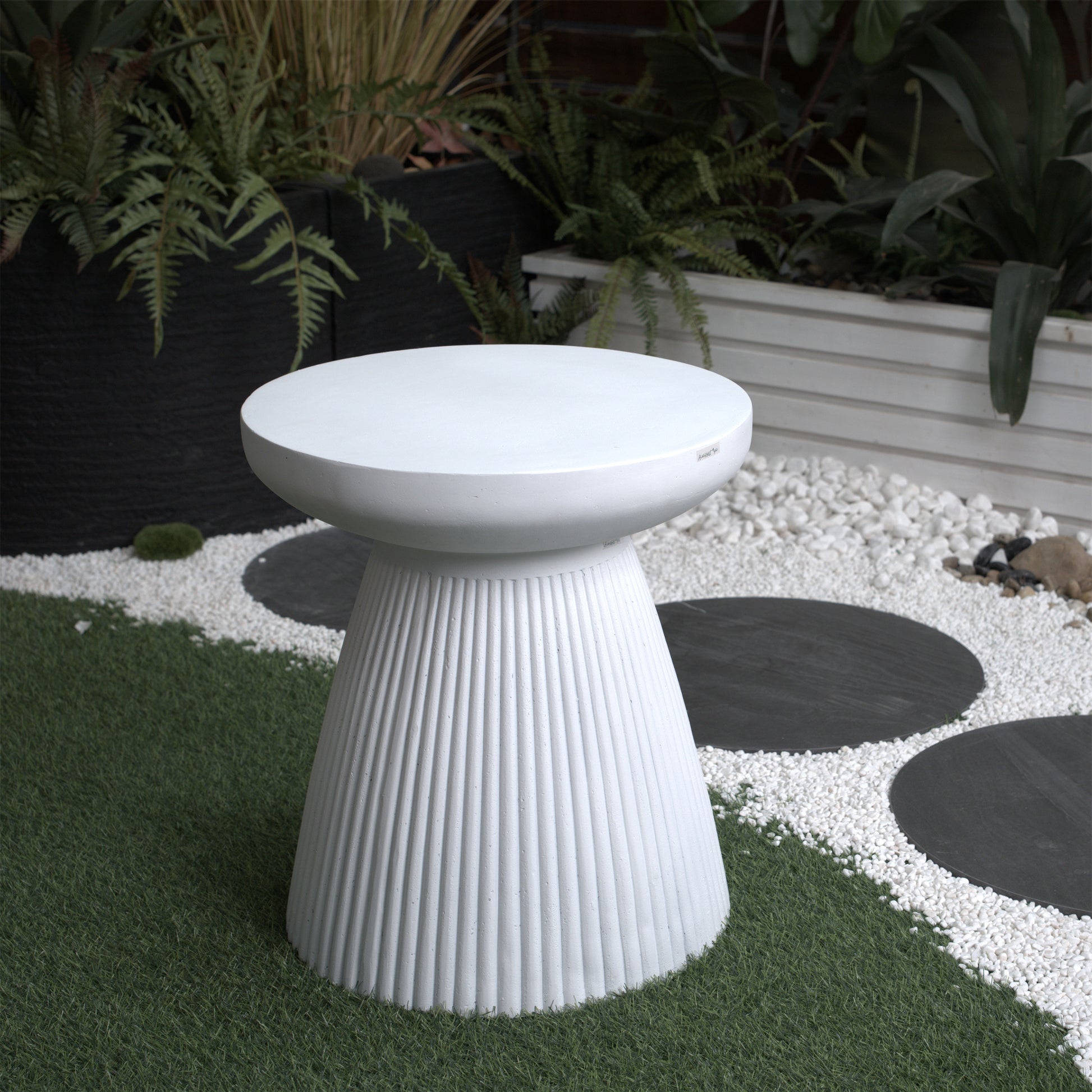 White fluted outdoor stool with round top perfect as a garden accent table
