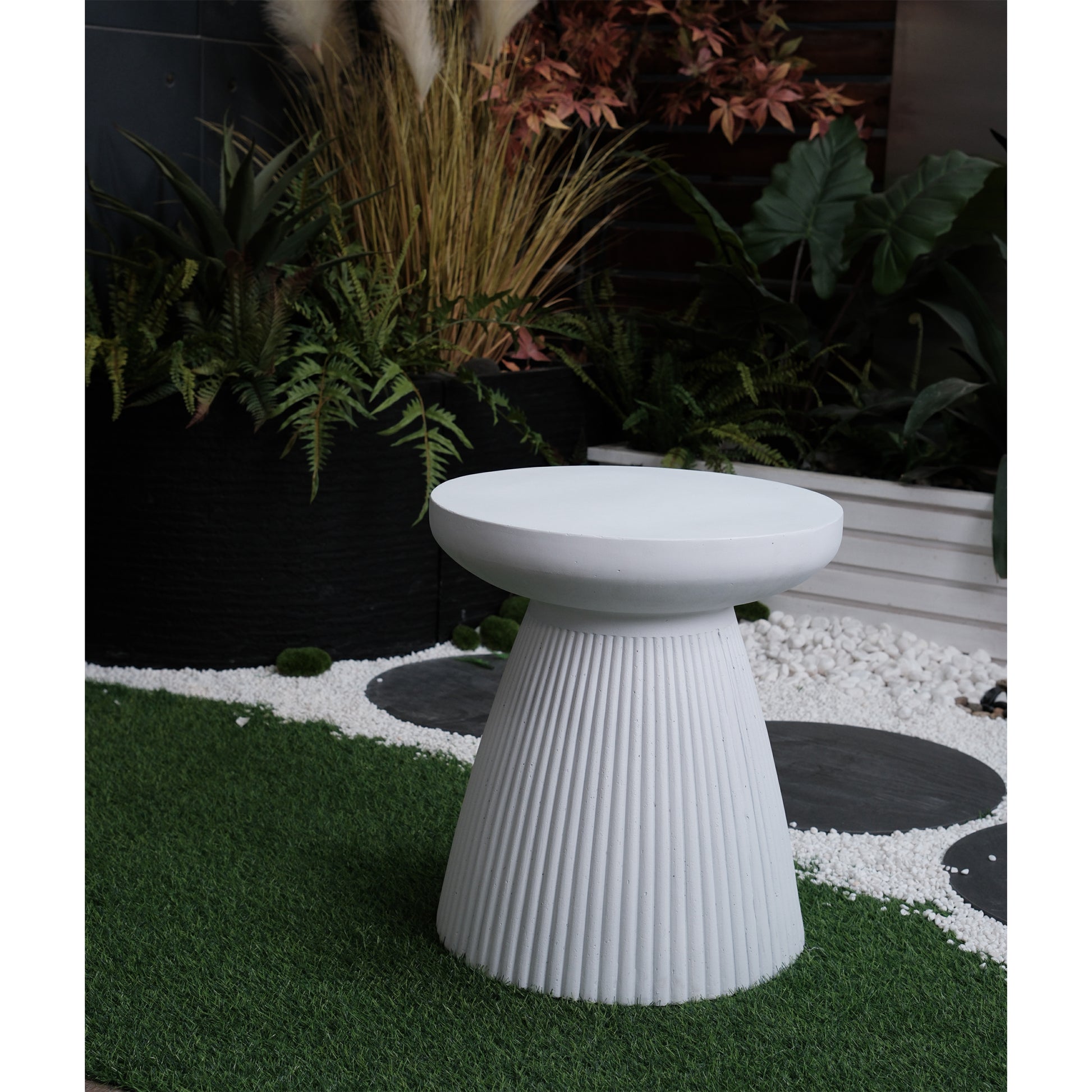 Modern white concrete garden stool with fluted base perfect outdoor accent