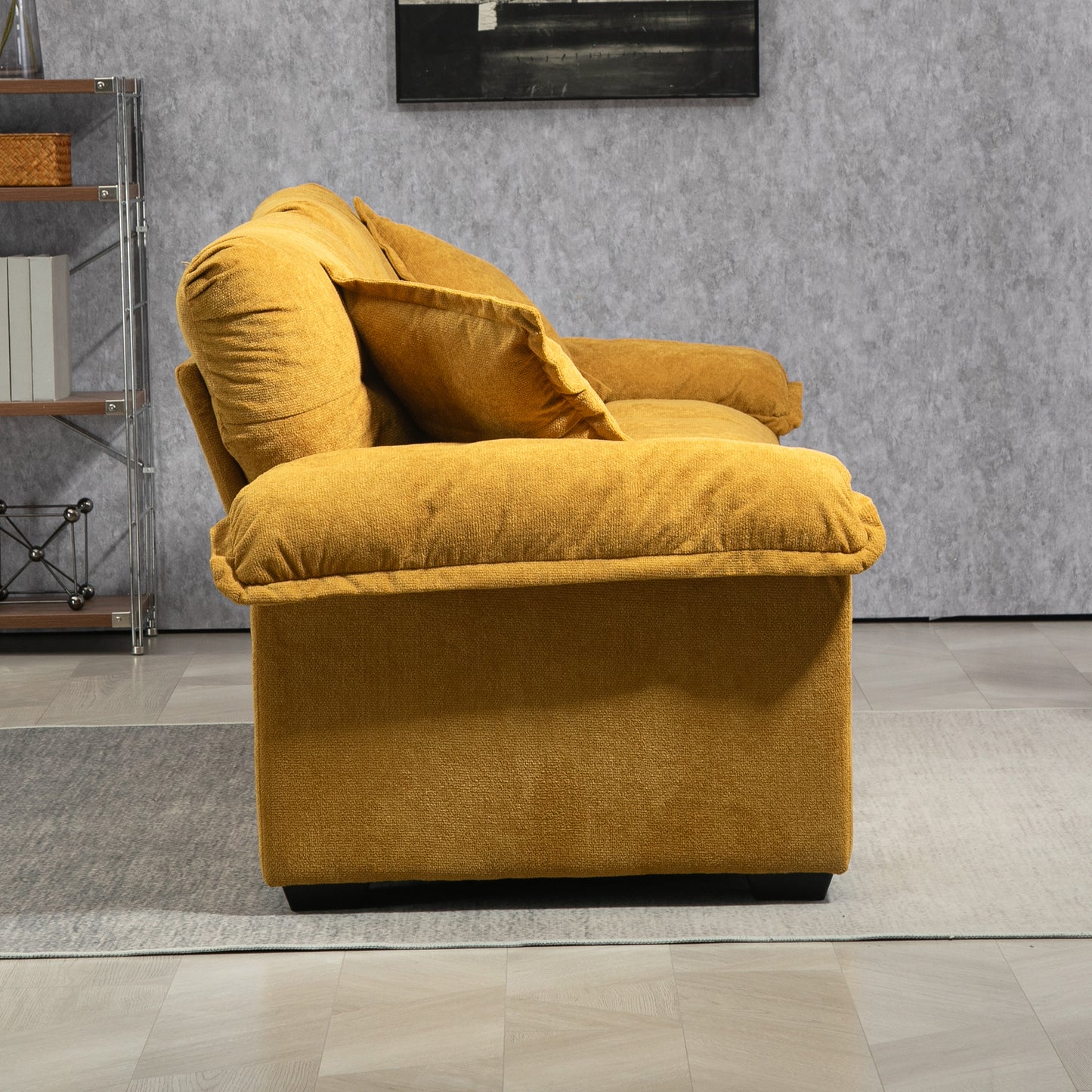 Mustard yellow sofa with plush cushions and textured fabric upholstery