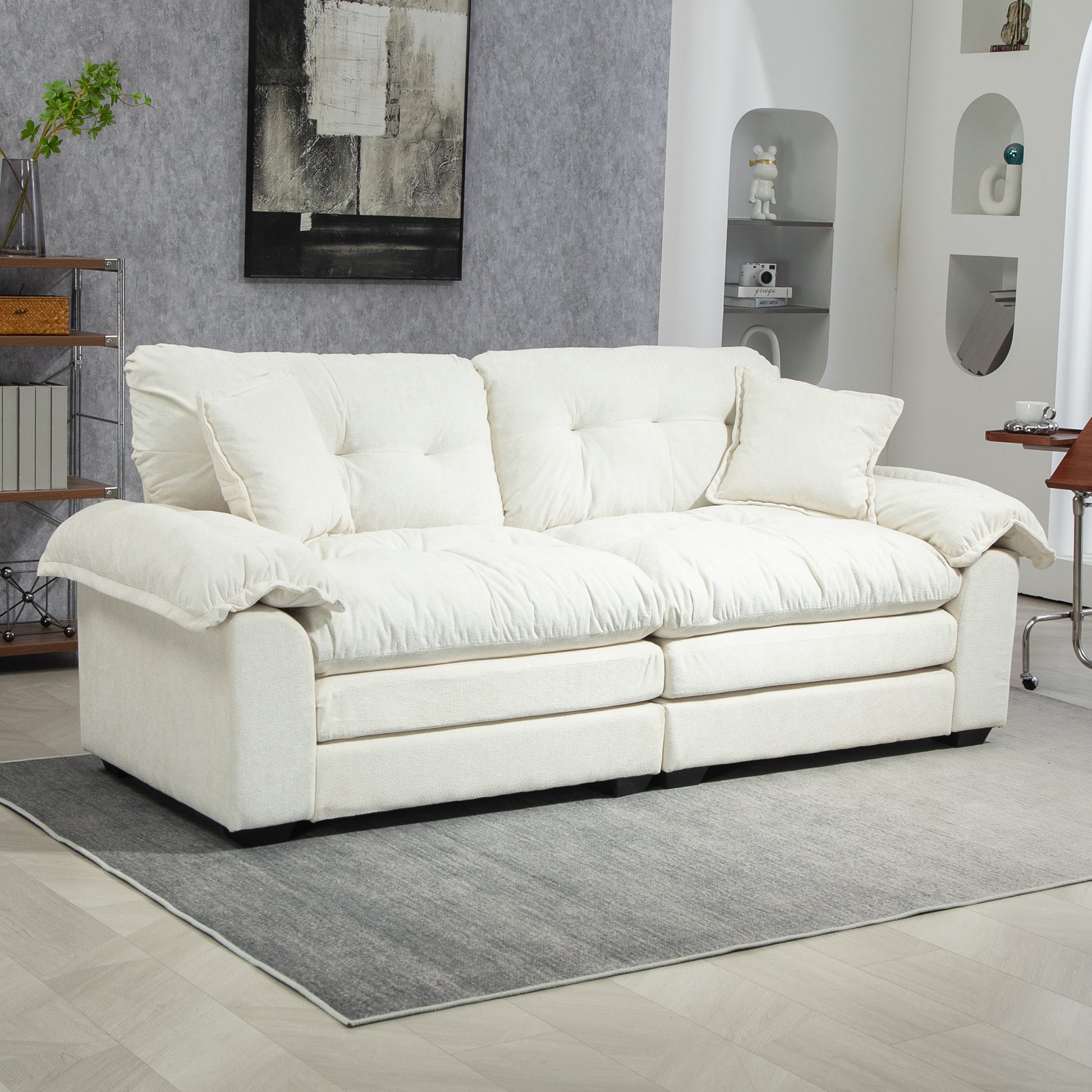 Plush cream sofa with tufted cushions perfect for modern living rooms
