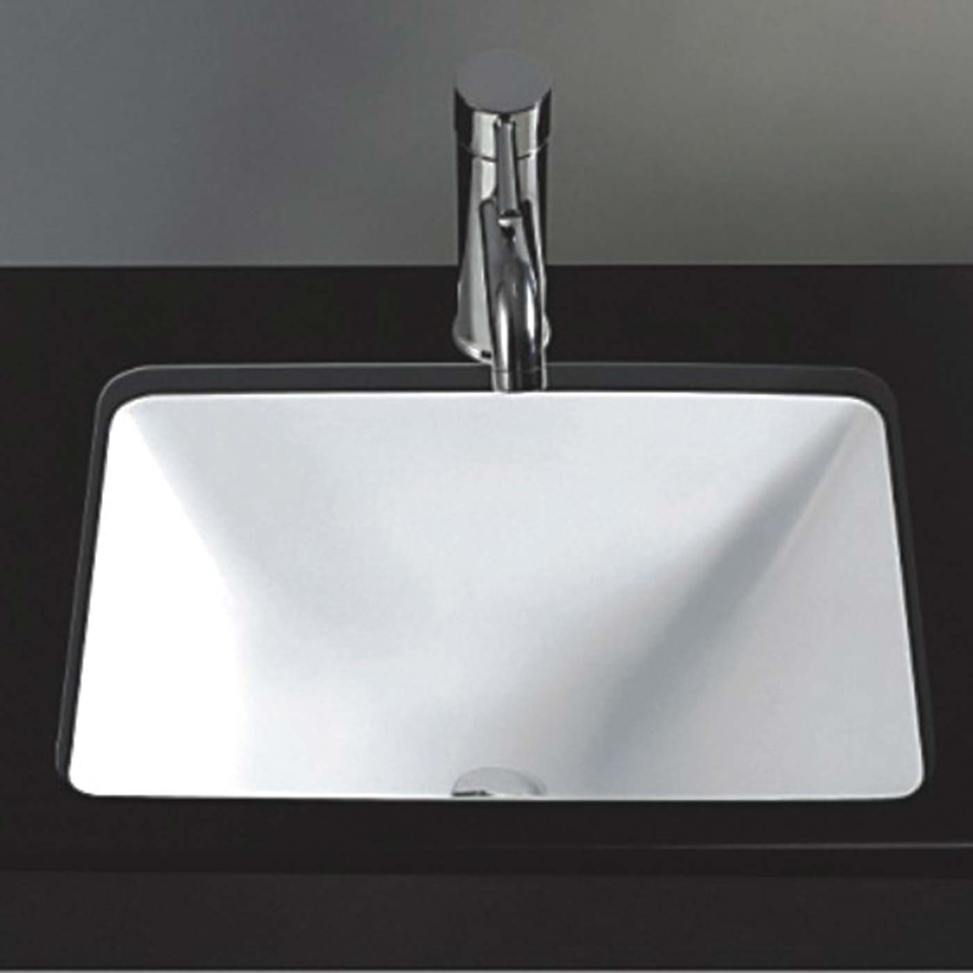 White rectangular ceramic vessel sink with modern chrome faucet