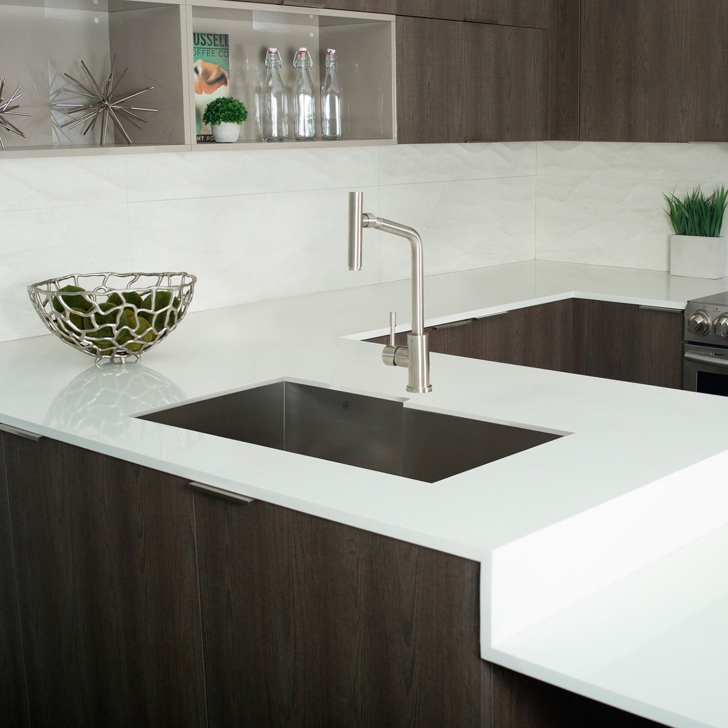 Modern stainless steel kitchen faucet with high arc over undermount sink