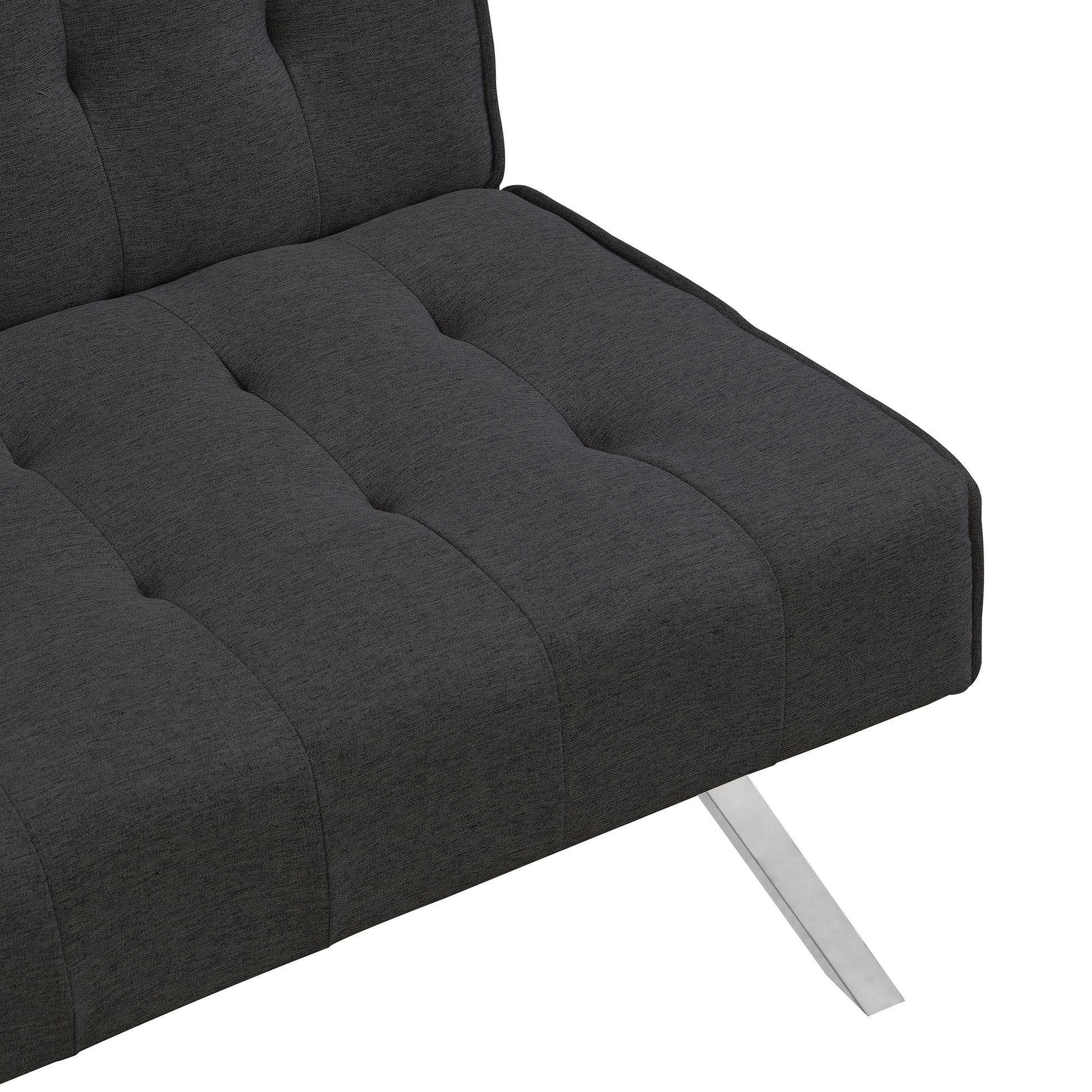 Tufted dark gray fabric sofa armrest detail with brushed metal leg