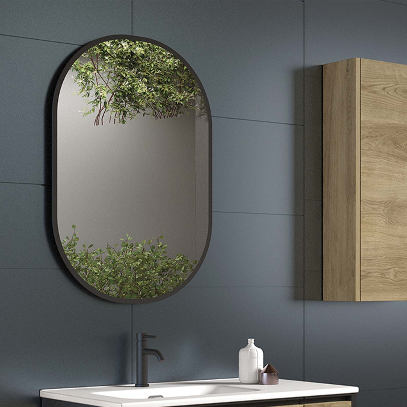 Modern oval bathroom mirror with black frame and reflective surface