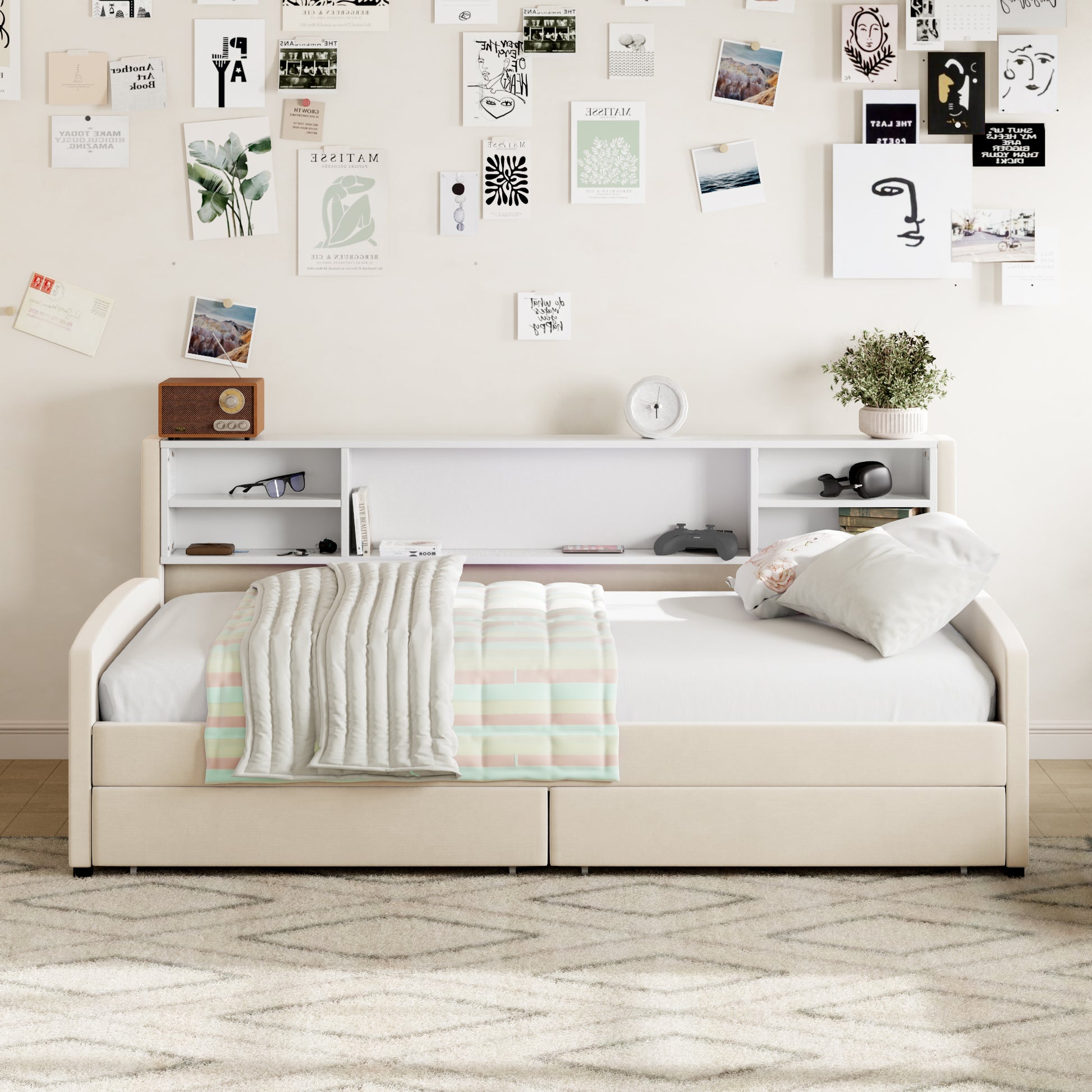 Cream upholstered twin daybed with storage drawers and attached bookcase shelf