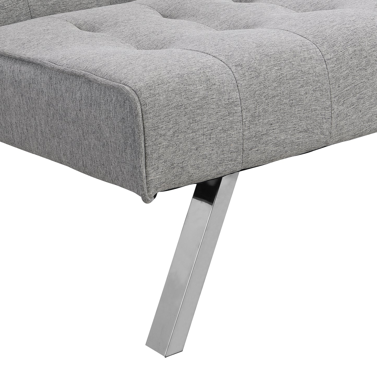 Closeup of grey fabric tufted sofa cushion with angled chrome leg detail