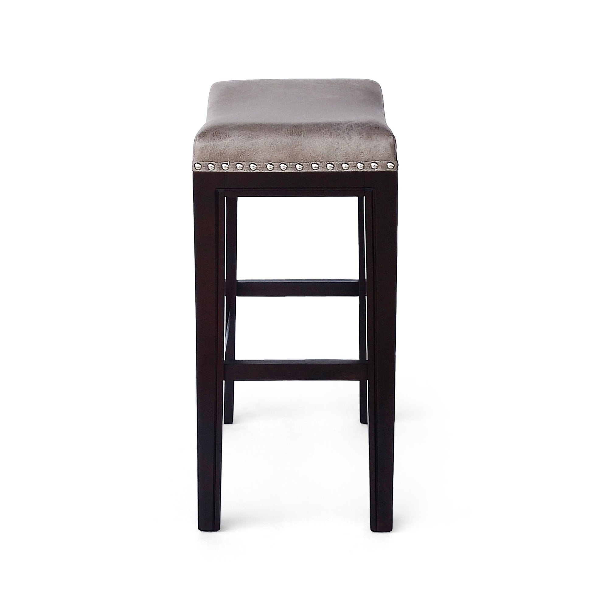Saddle bar stool with a grey velvet seat and dark espresso wooden legs adorned with silver nailhead trim