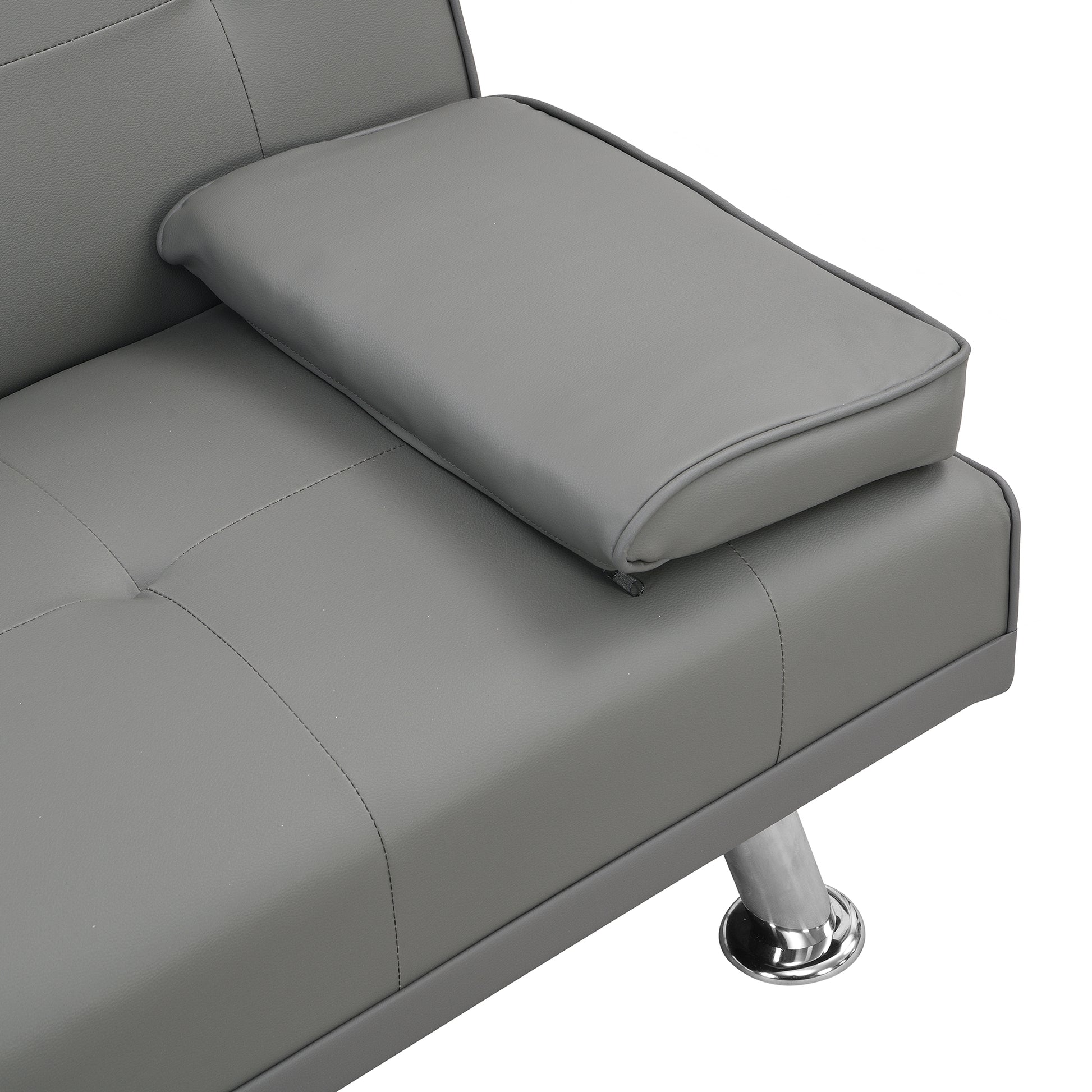 Gray faux leather sofa armrest with stitched detailing and chrome leg