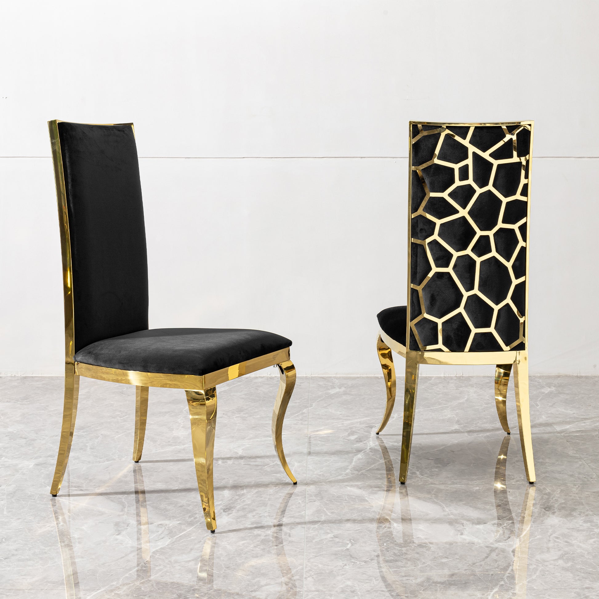Black velvet dining chair with gold frame and curved legs