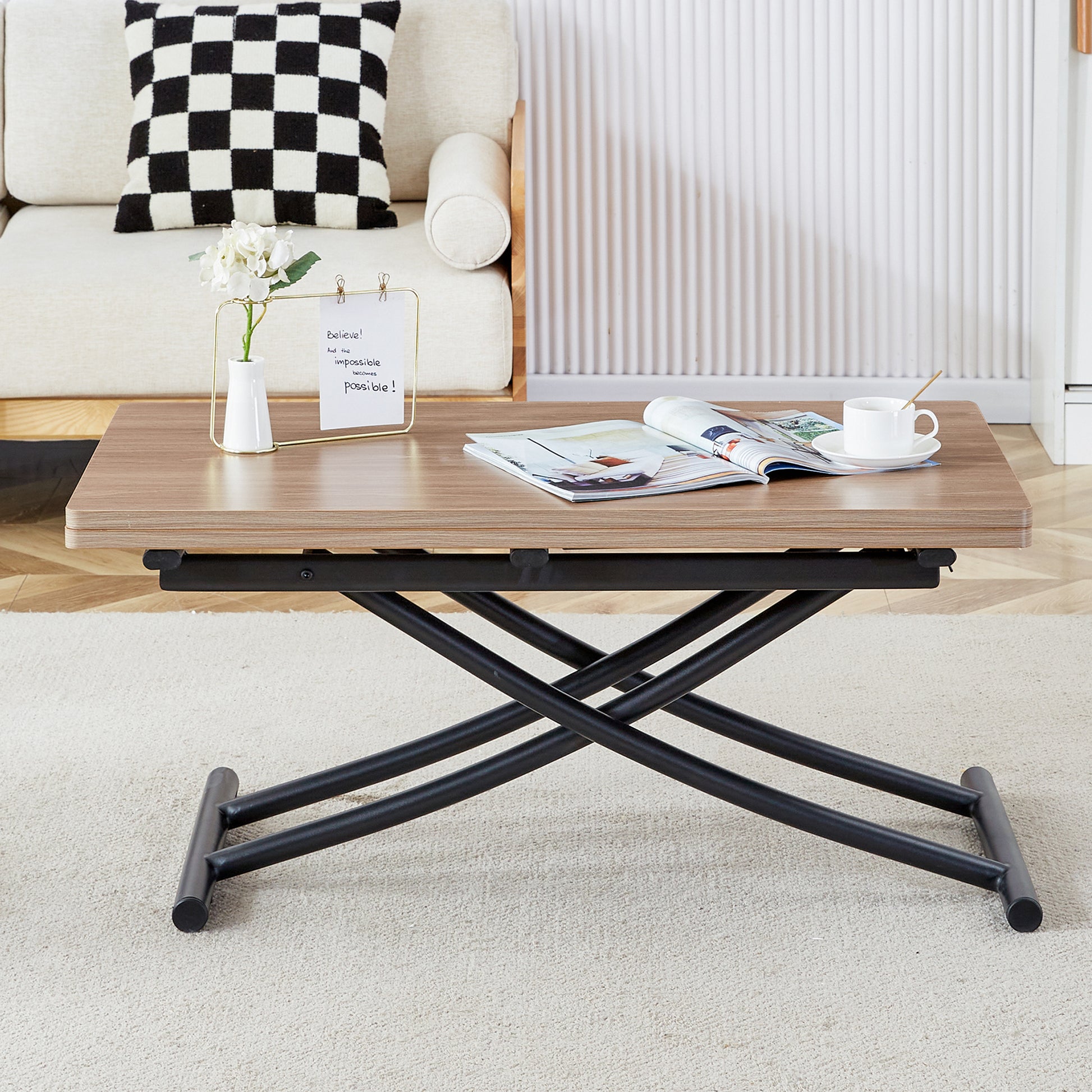 Lift top coffee table with wood grain finish and black metal scissor legs perfect for modern living rooms