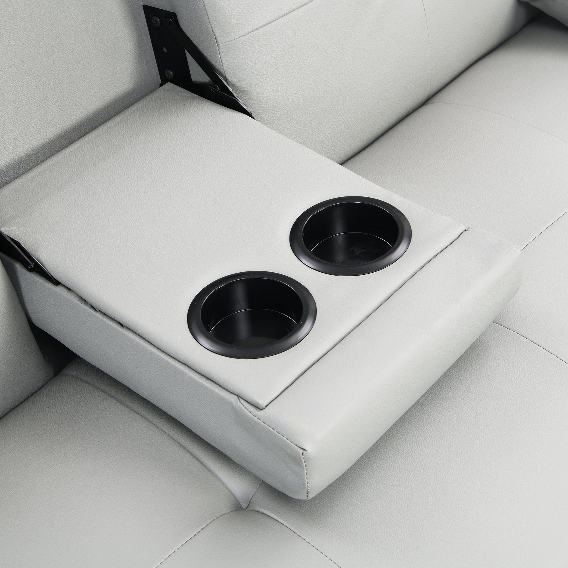 Light gray faux leather loveseat with builtin dual cup holders