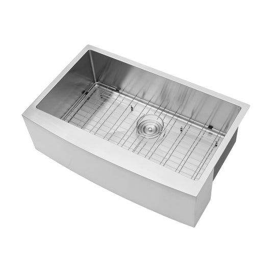 Sleek stainless steel farmhouse sink with integrated drain grid and curved apron front