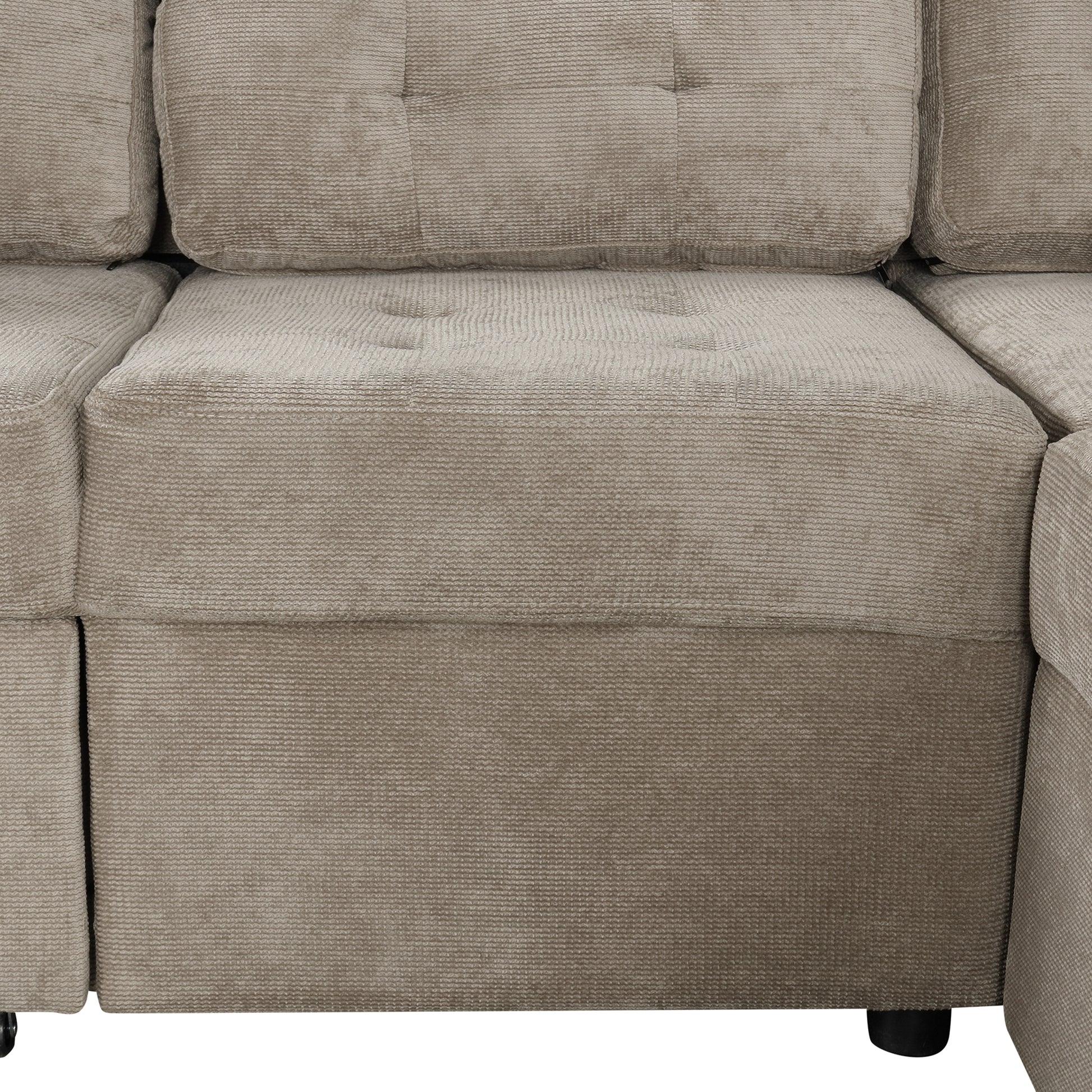 Taupe corduroy sectional sofa with tufted back cushions and a pullout bed feature
