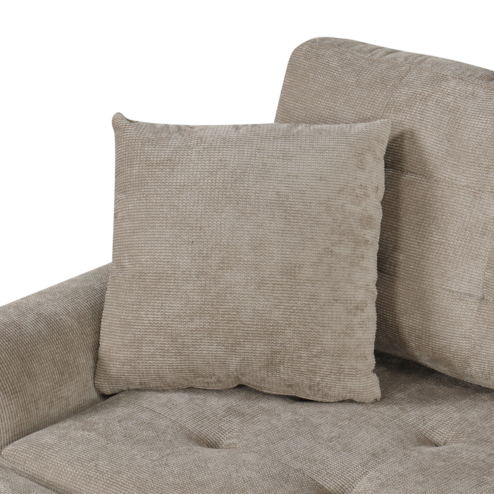 Closeup of a textured beige throw pillow with a woven fabric pattern
