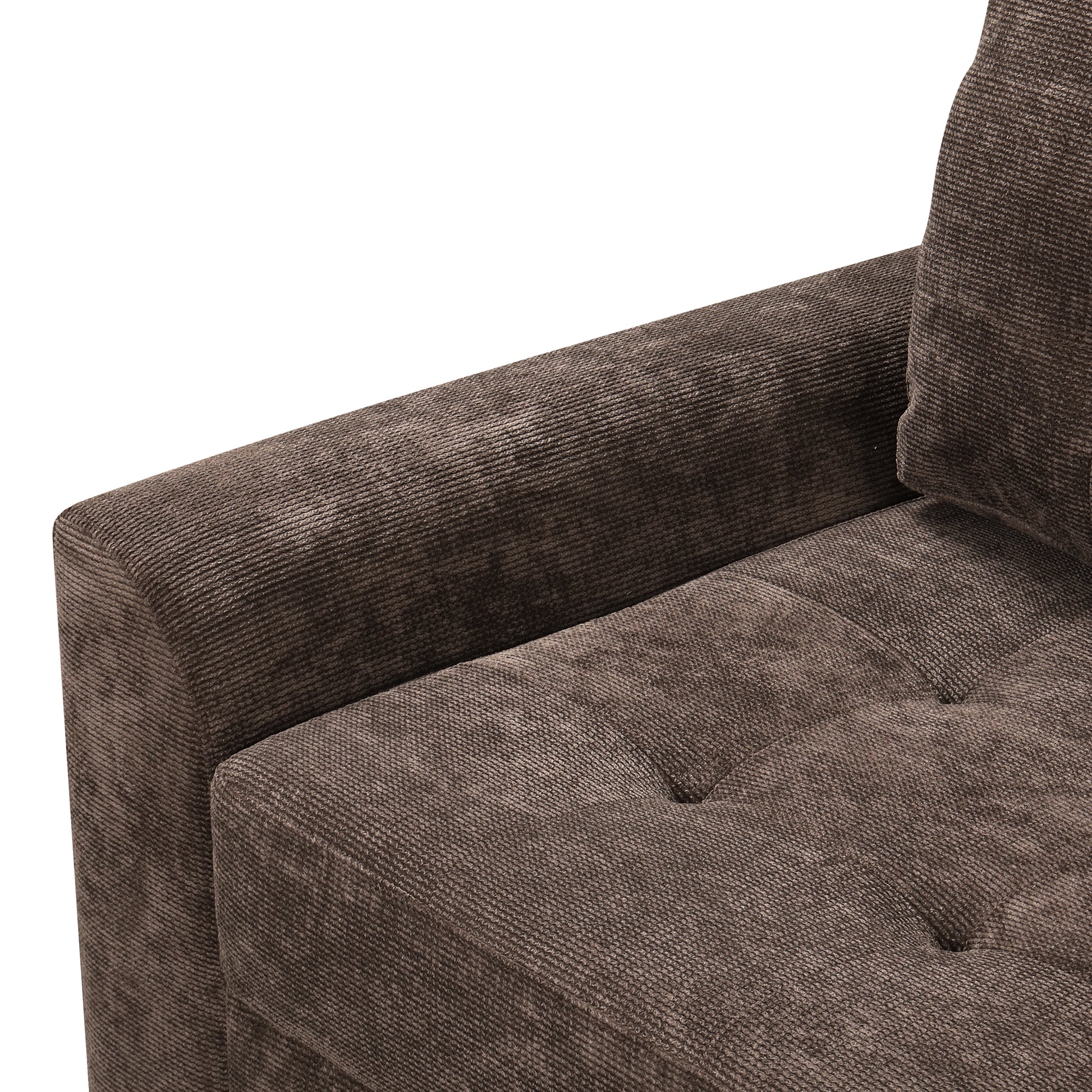 Brown corduroy sofa armrest with tufted seat detail