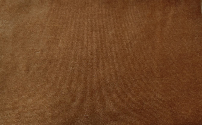 Rich brown velvet fabric with a soft texture and subtle vertical ribs for upholstery projects