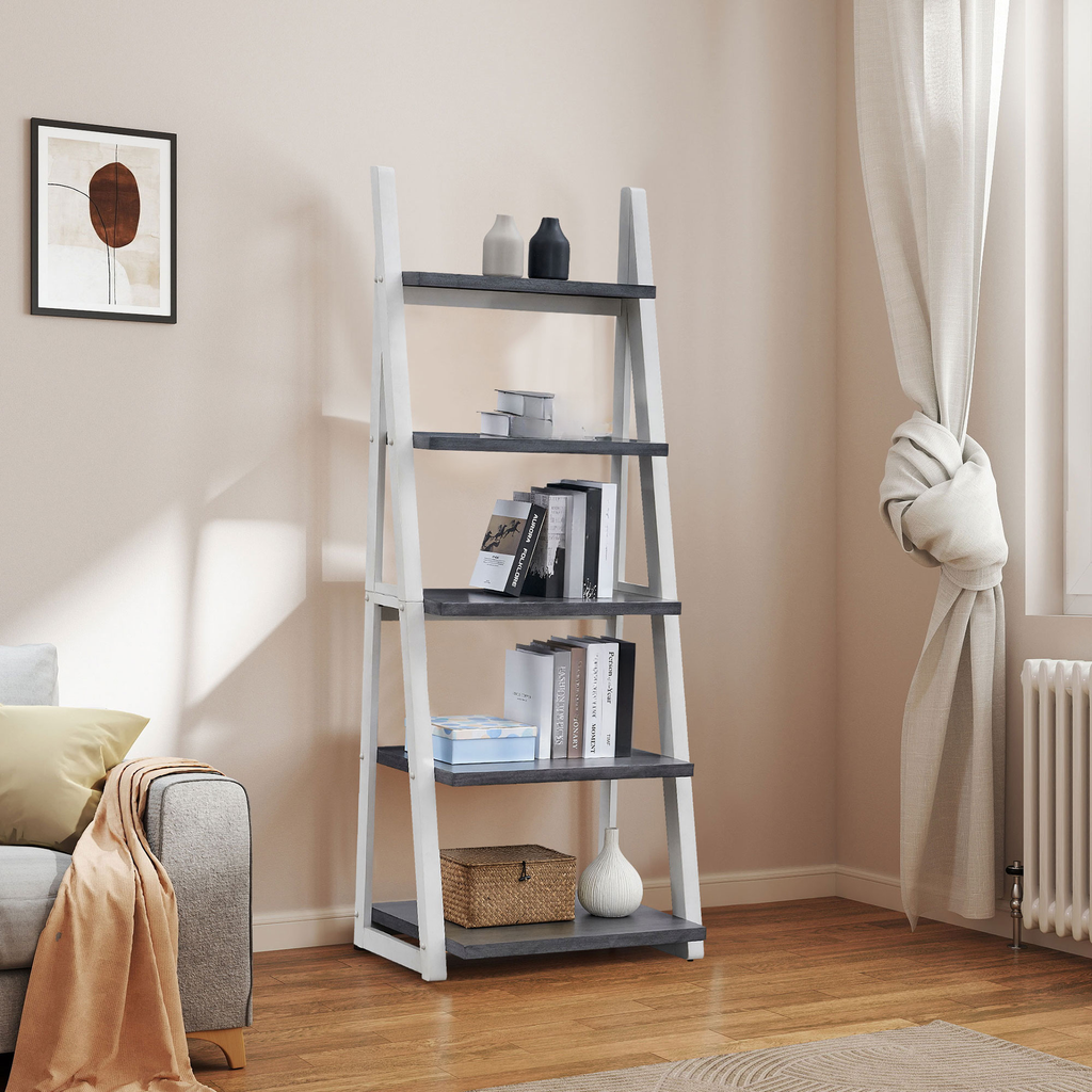 Gray and white leaning bookshelf filled with books and decor items