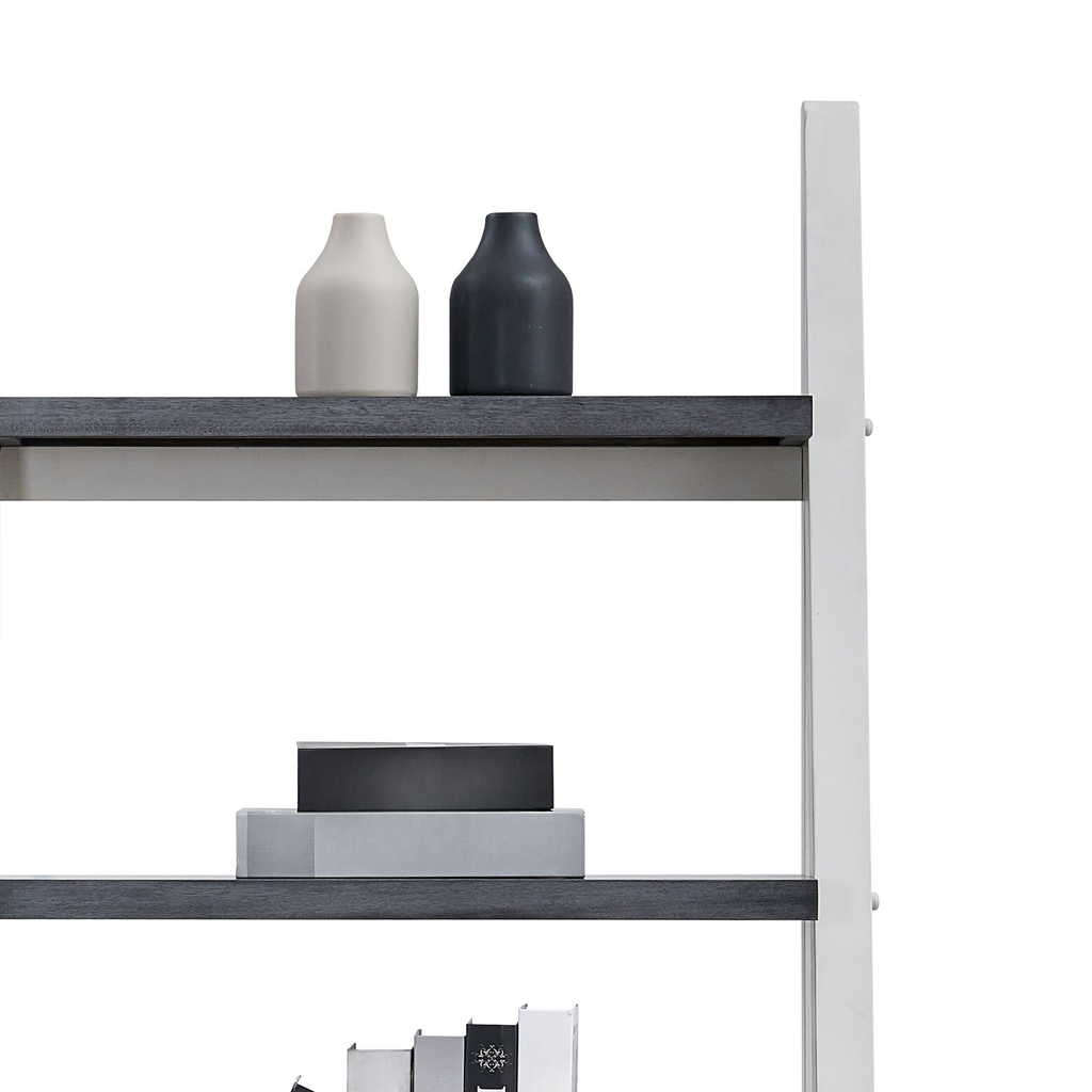 Modern bookshelf with white frame and dark grey shelves showcasing decorative vases