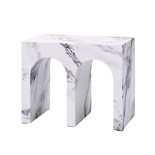 Modern faux marble accent stool with arched legs and unique veining patterns