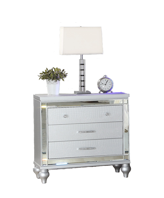 Elegant silver crocodileembossed dresser with mirrored accents and crystal knobs